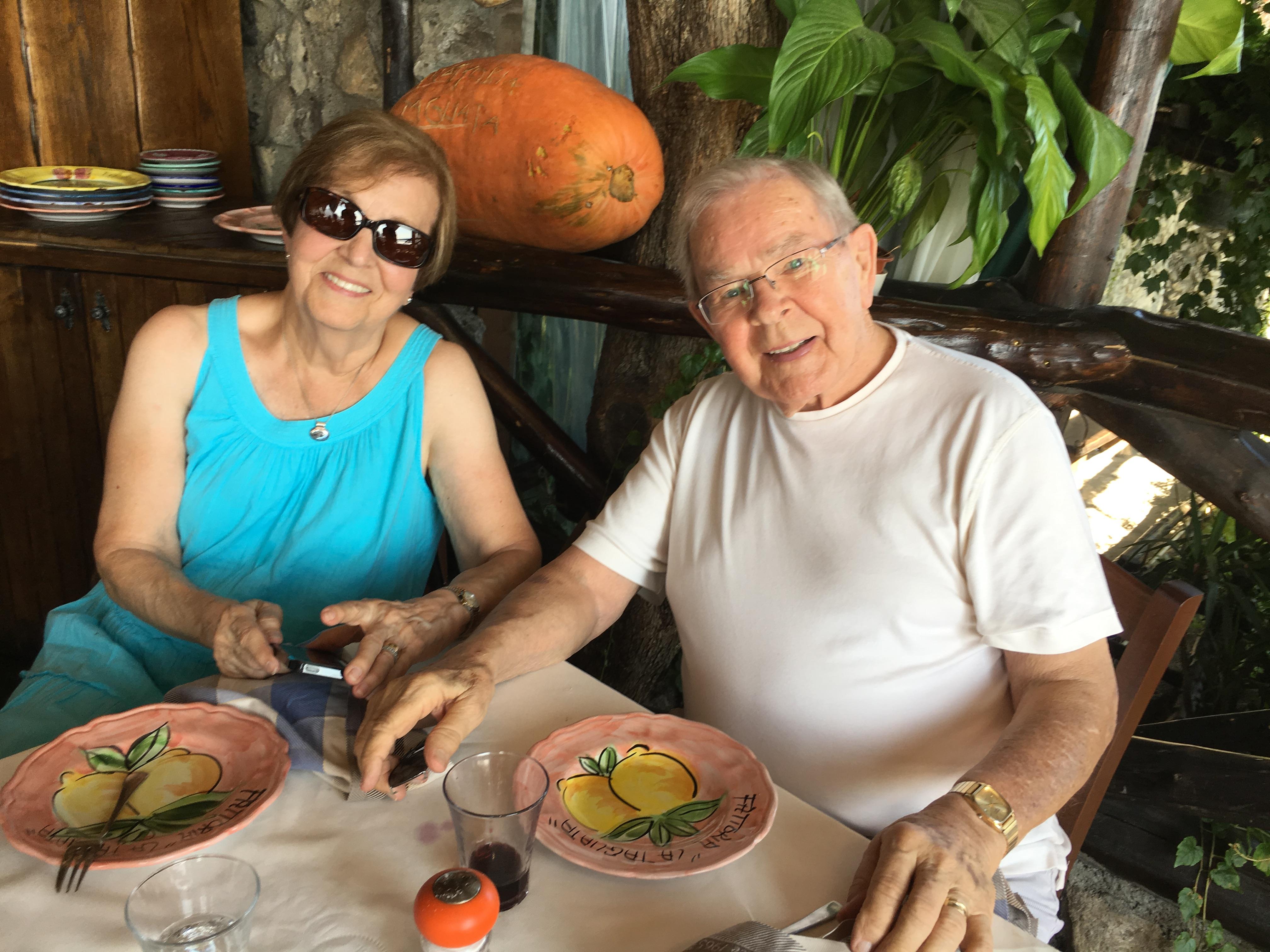 A man and woman sitting at a table