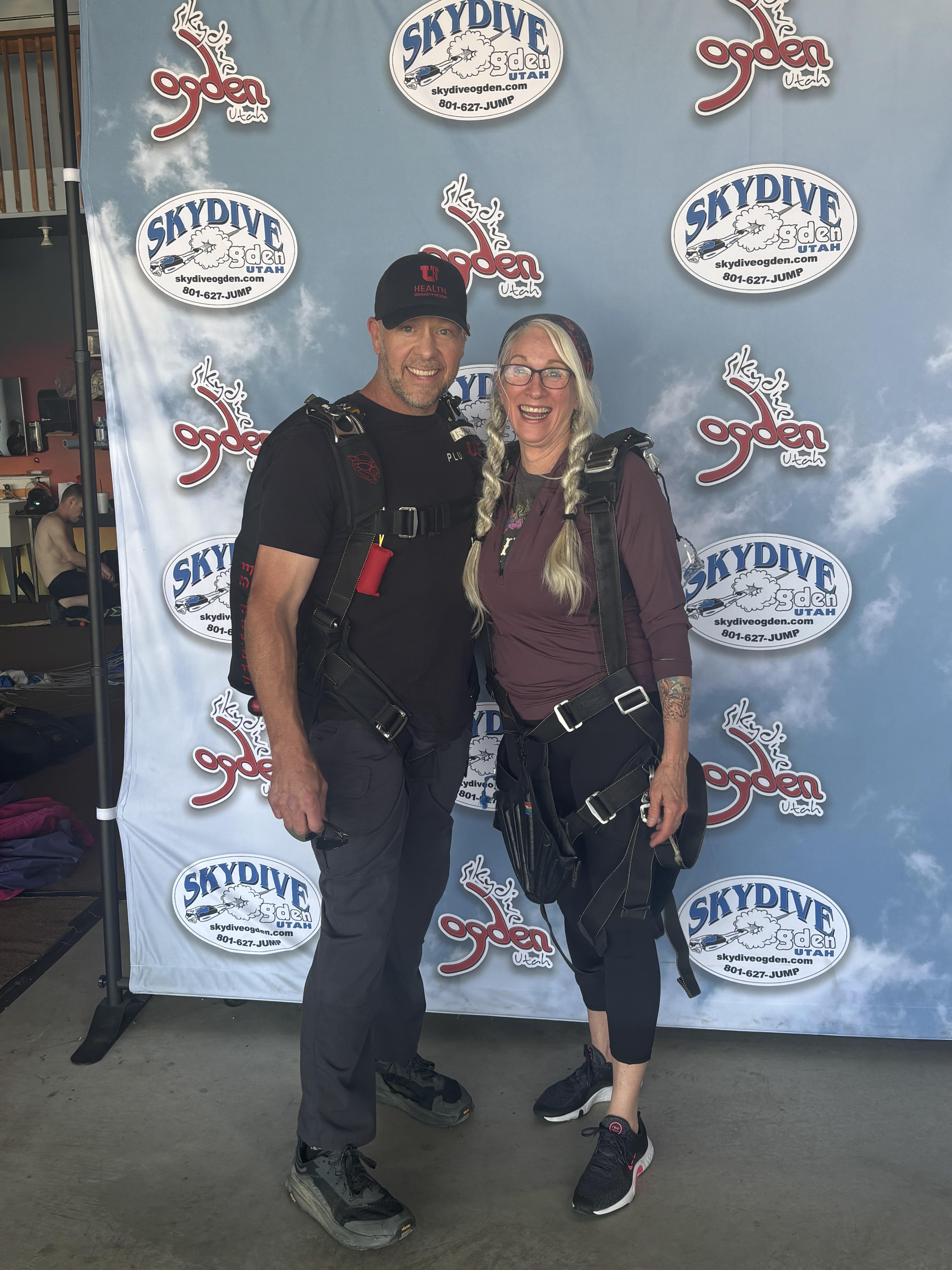 A man and woman posing for a picture