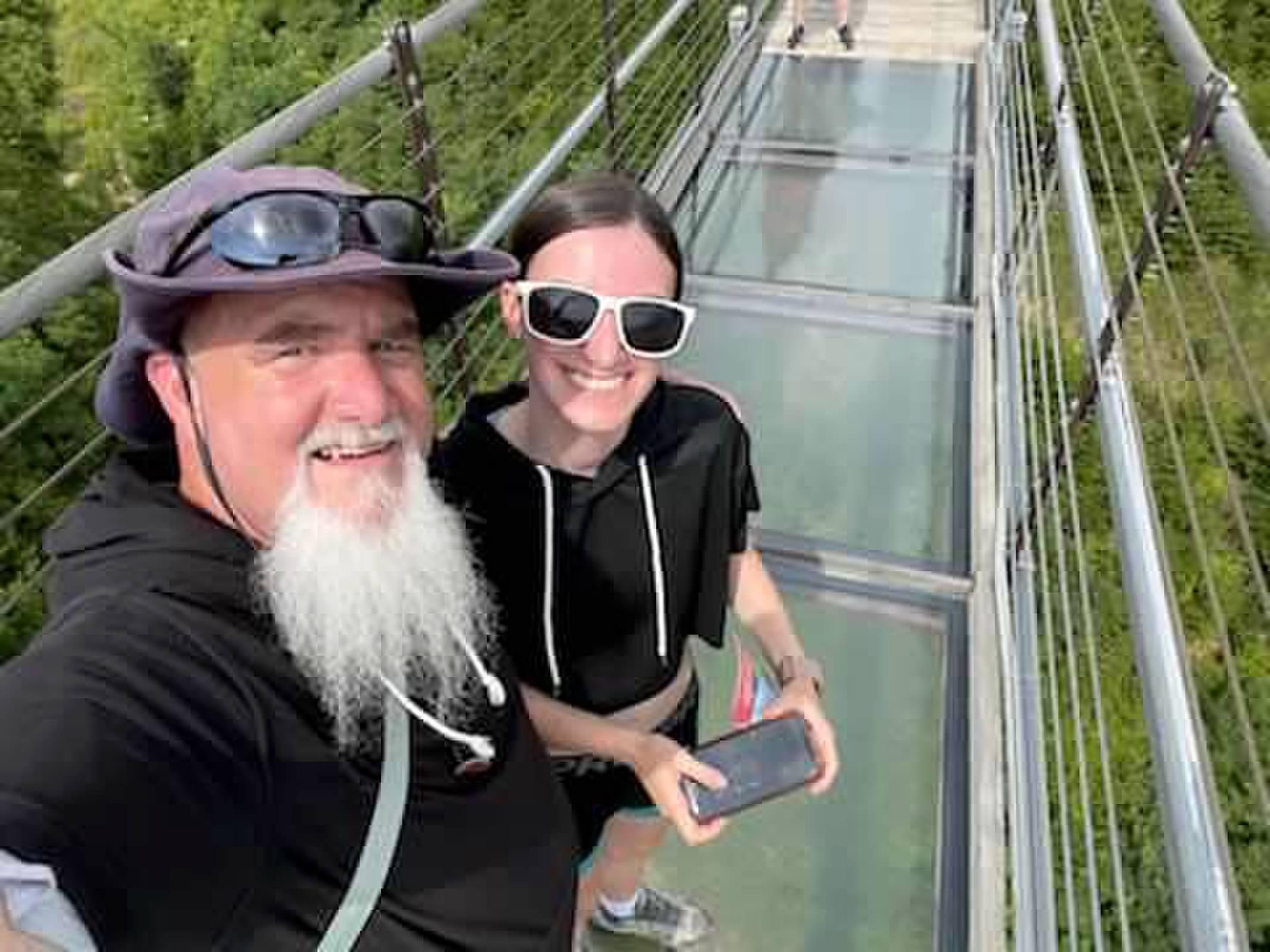 A man and woman taking a selfie