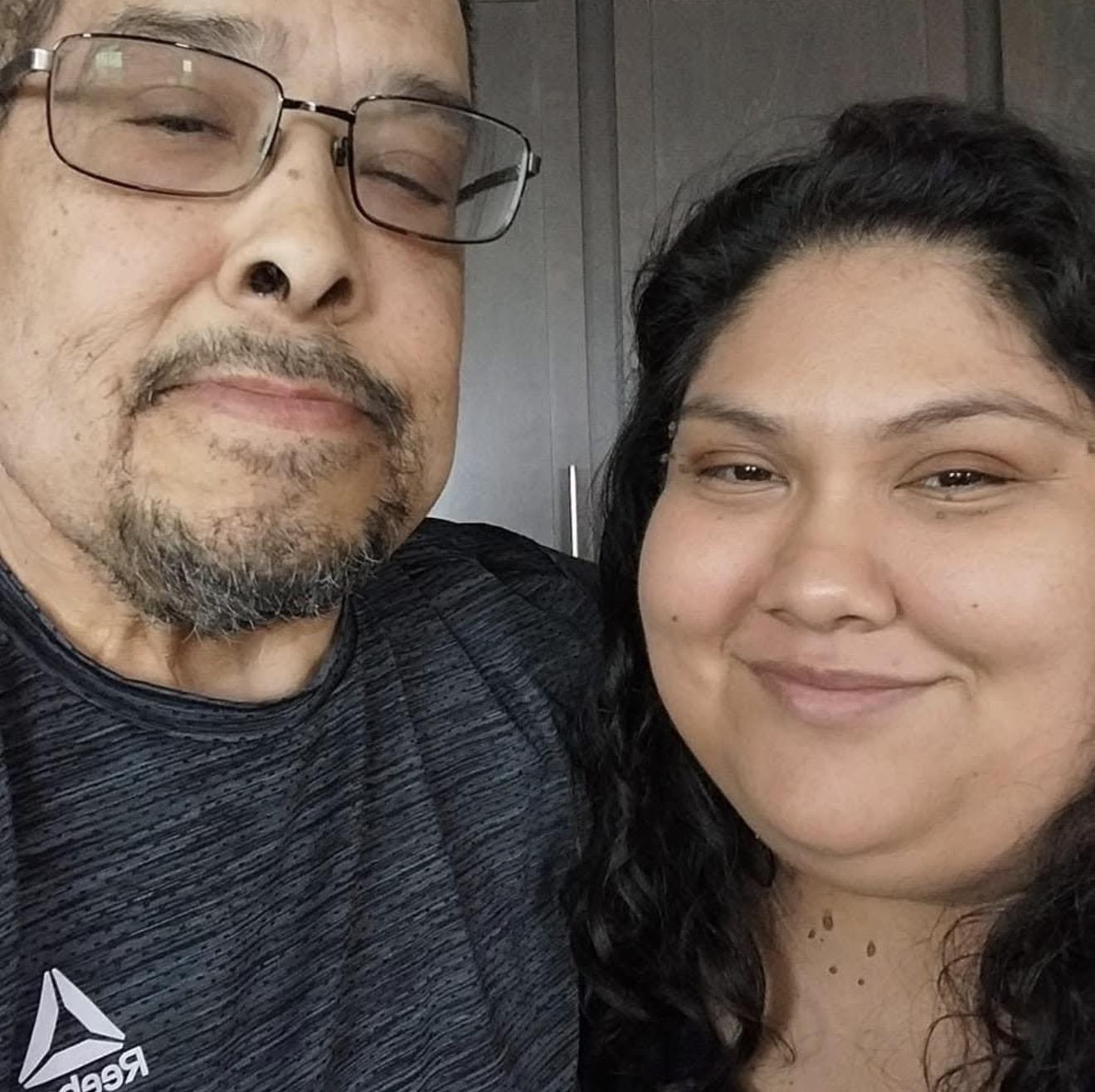 A man and woman taking a selfie