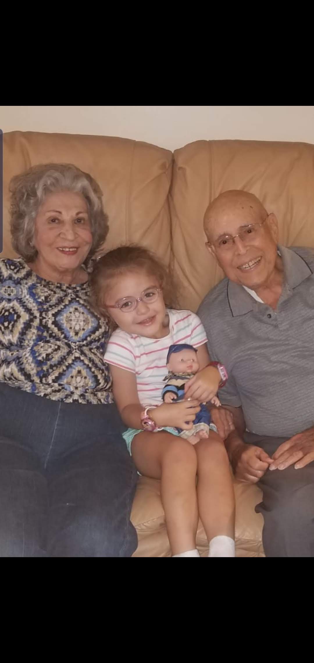 A group of people sitting on a couch