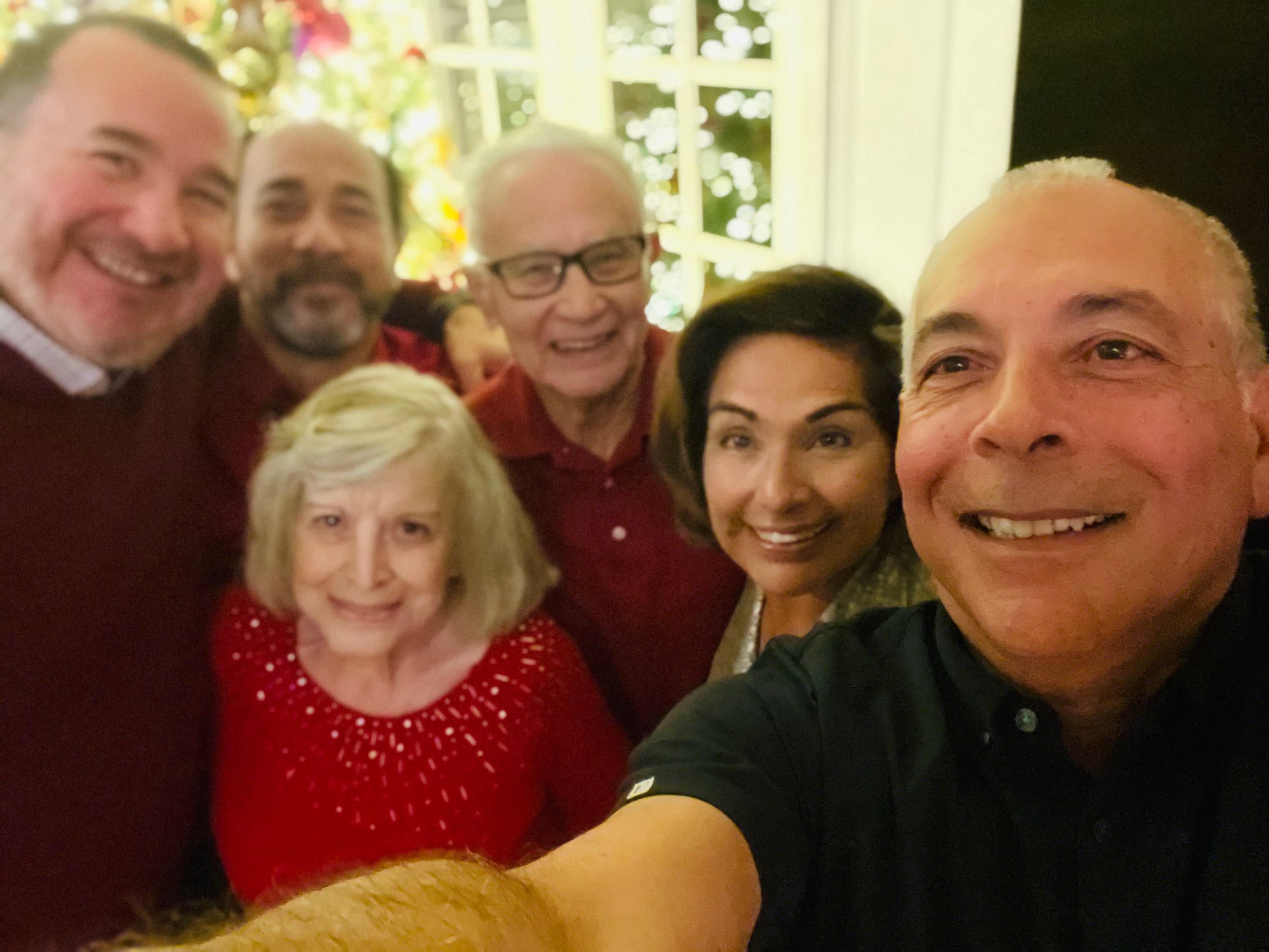 A group of people taking a selfie