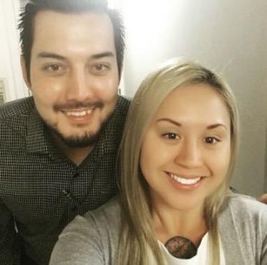 A man and woman taking a selfie