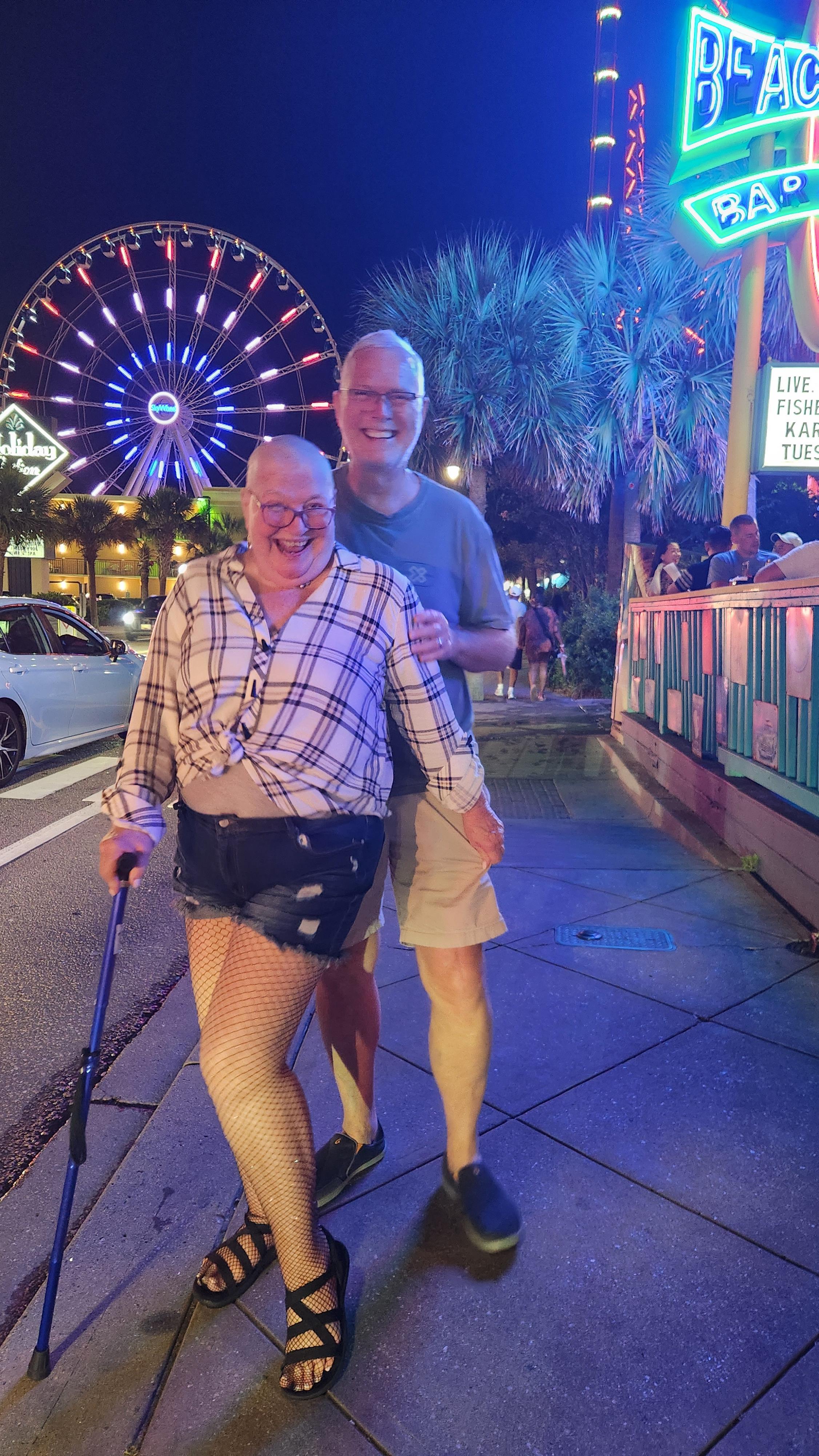 A man and woman posing for a picture