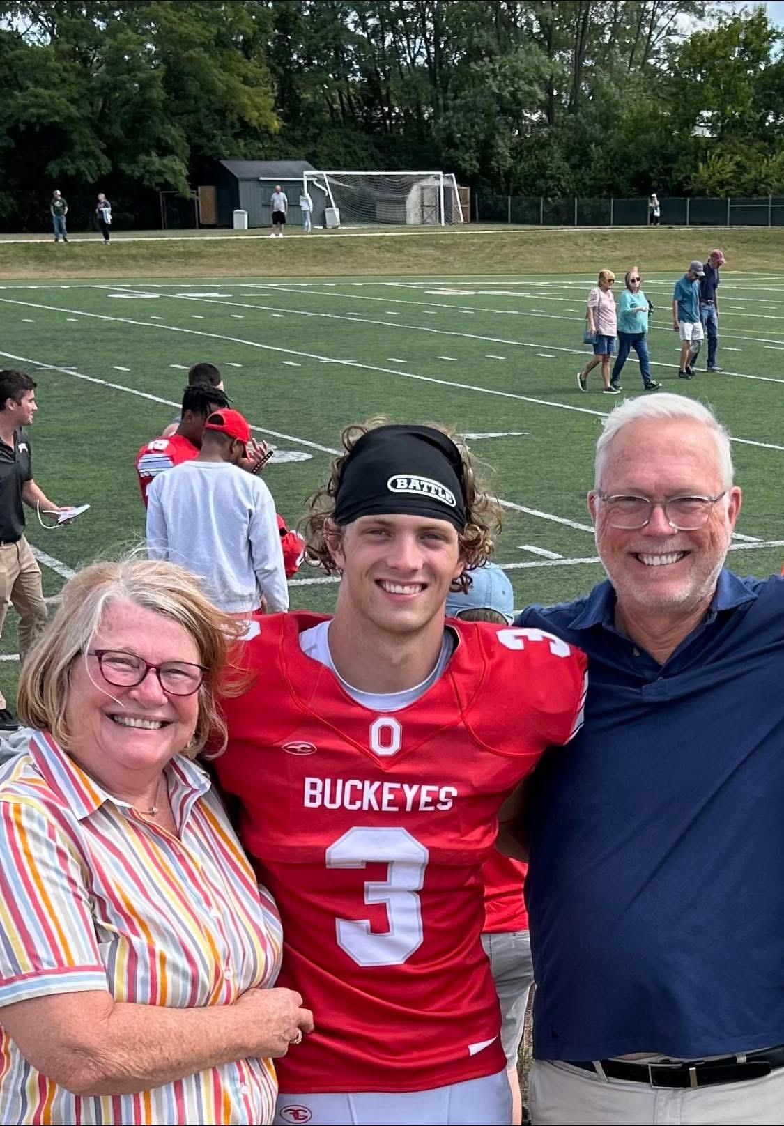 A man and woman posing for a picture