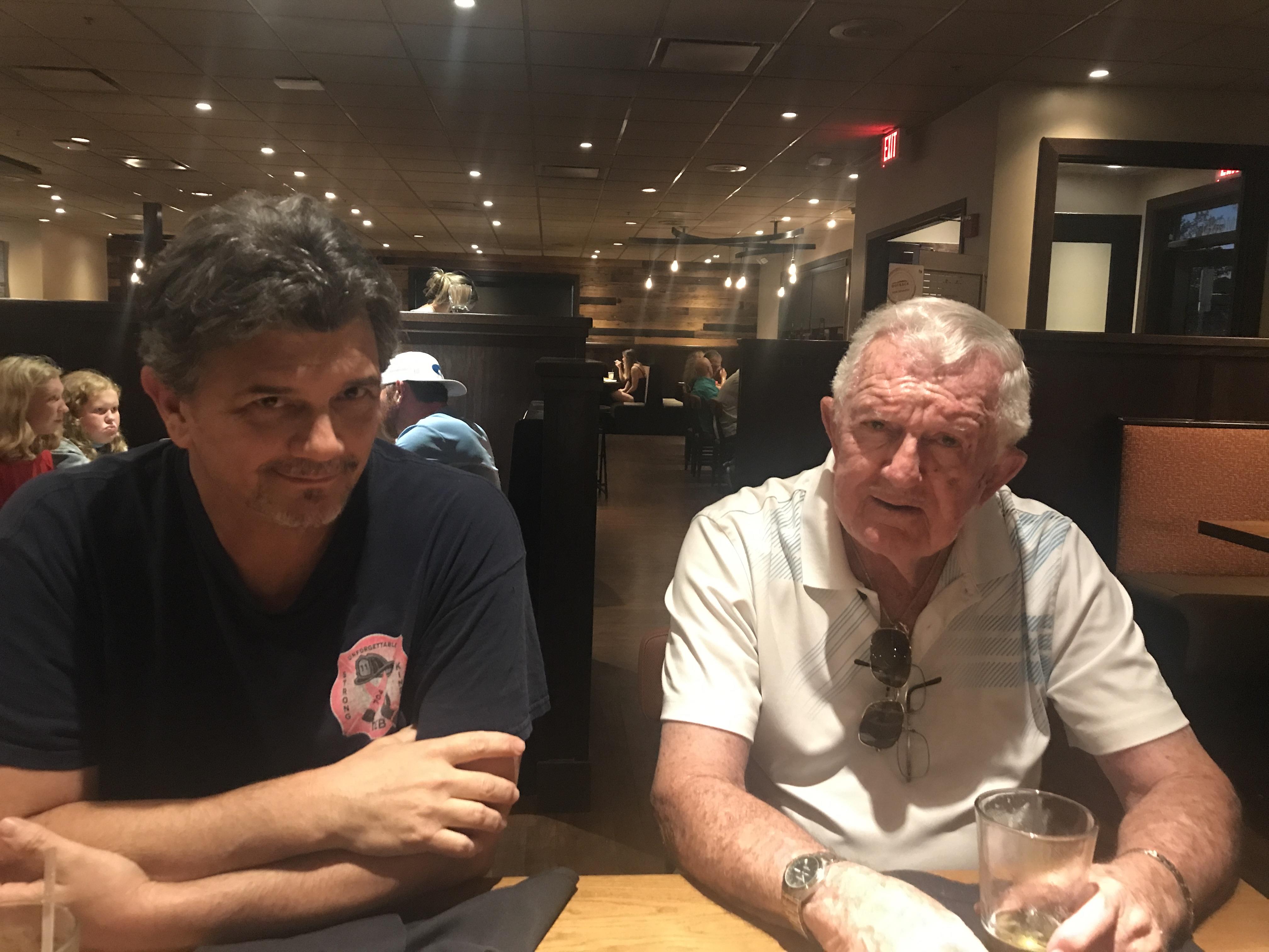 Two men sitting at a table
