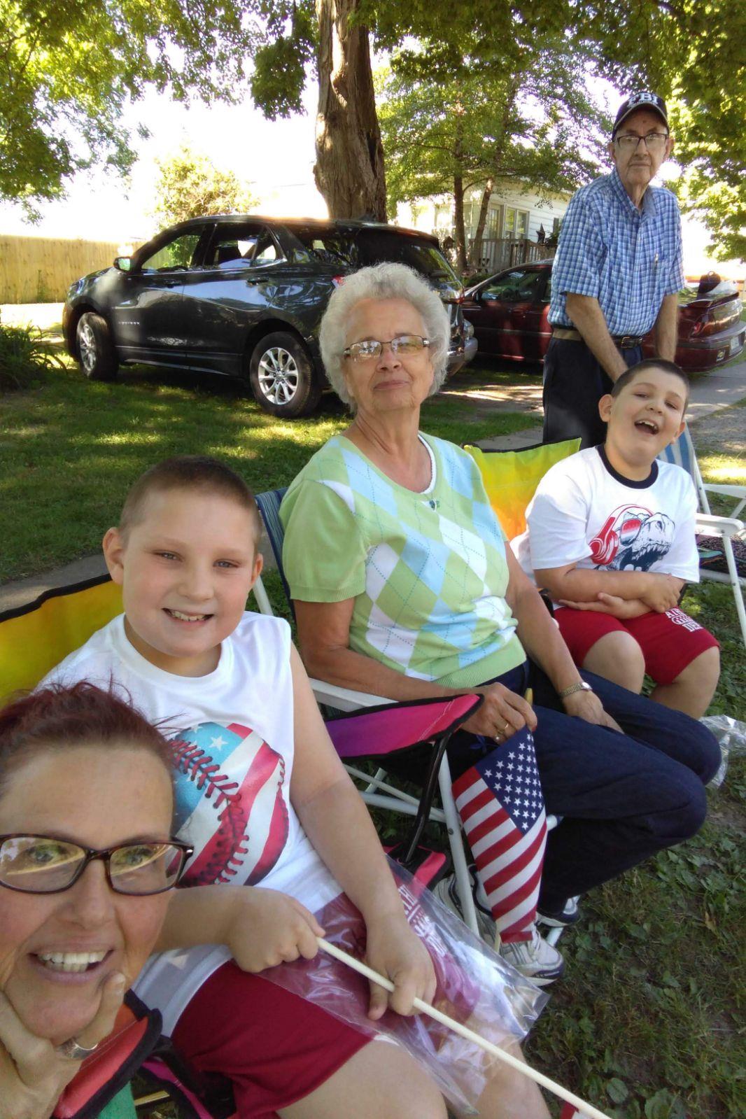 A group of people sitting in chairs