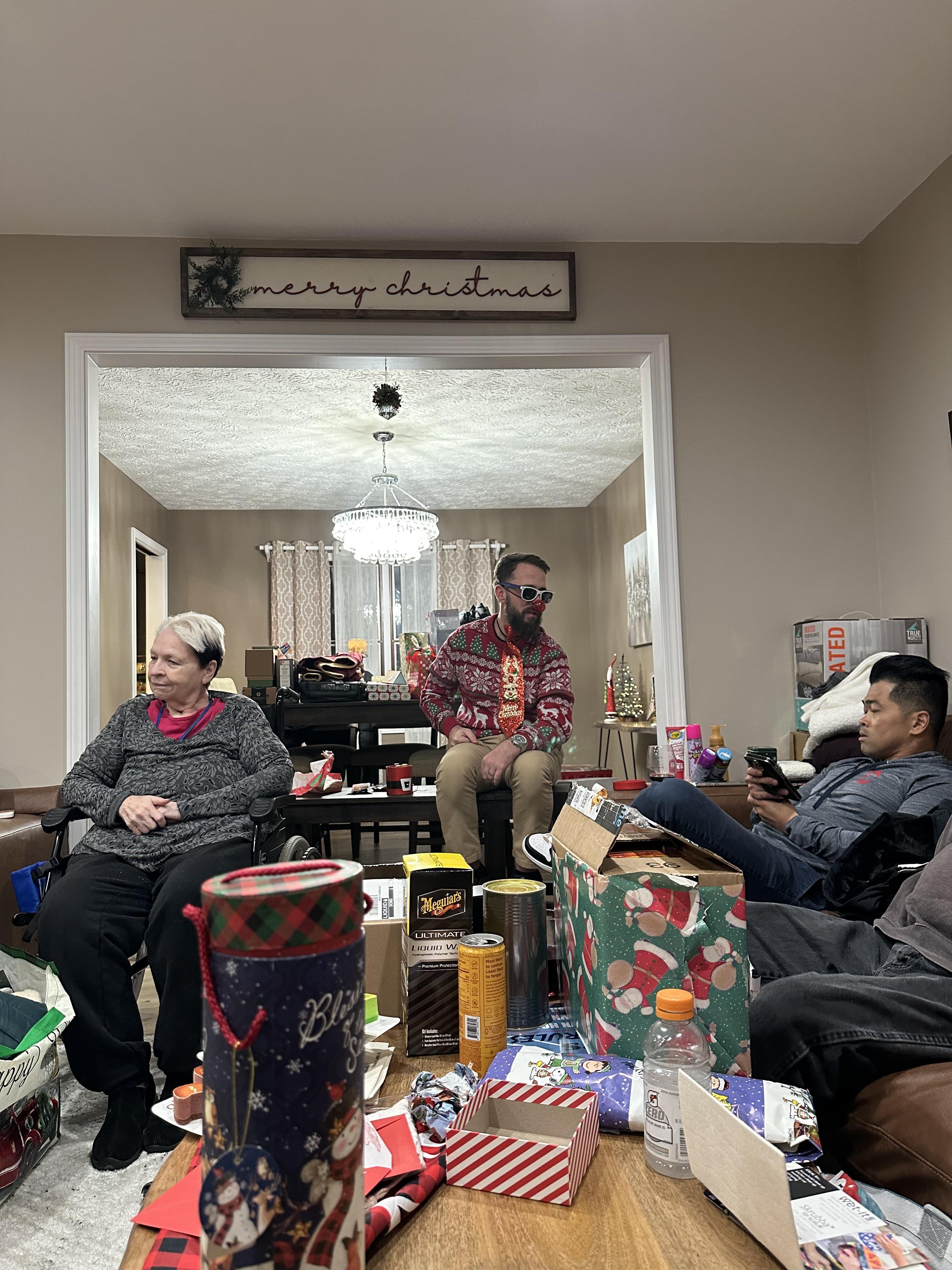 A group of people sitting in a living room