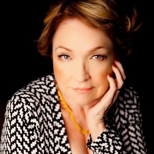 A woman with her hand on her face