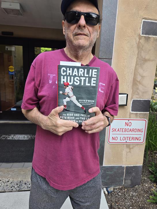 A man holding a book