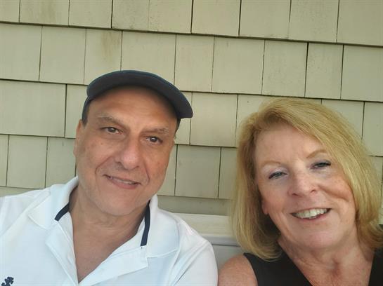 A man and woman smiling for a picture