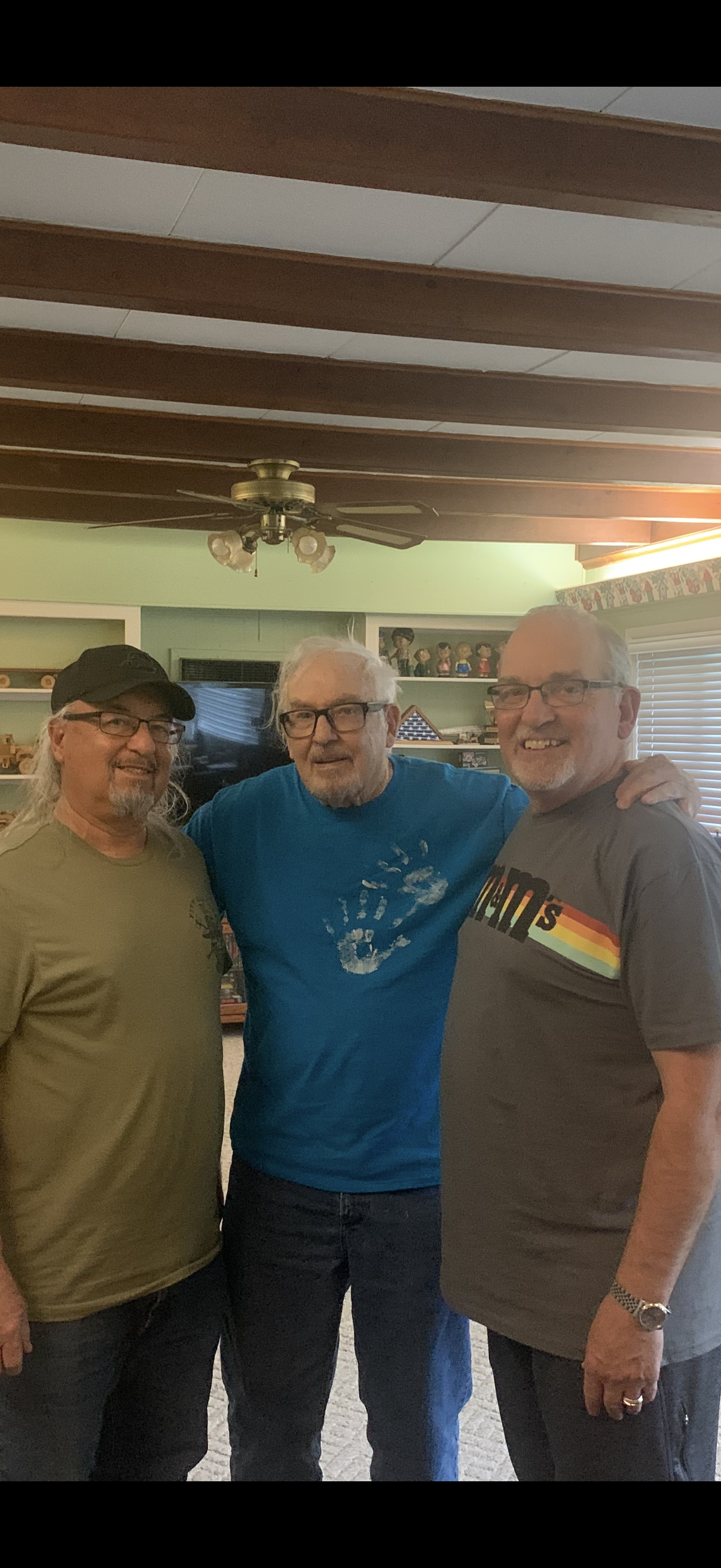 A group of men posing for a picture