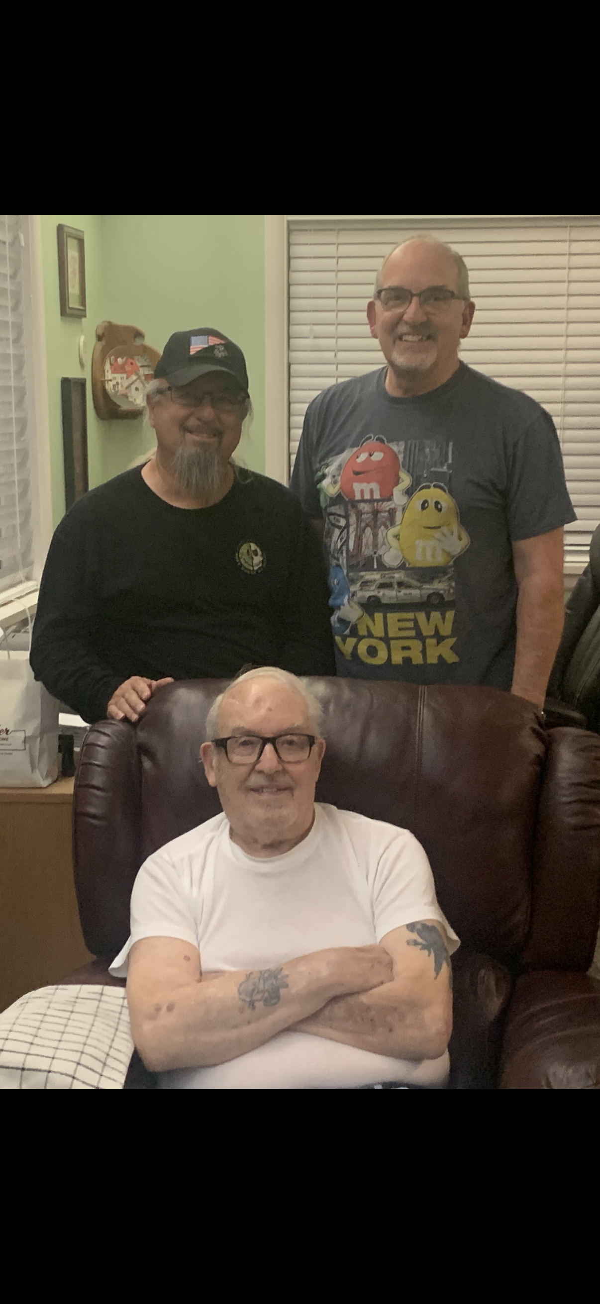 A group of men posing for a photo