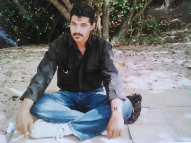 A man sitting on the ground