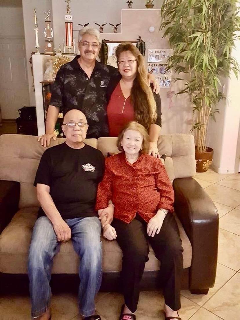 A group of people sitting on a couch