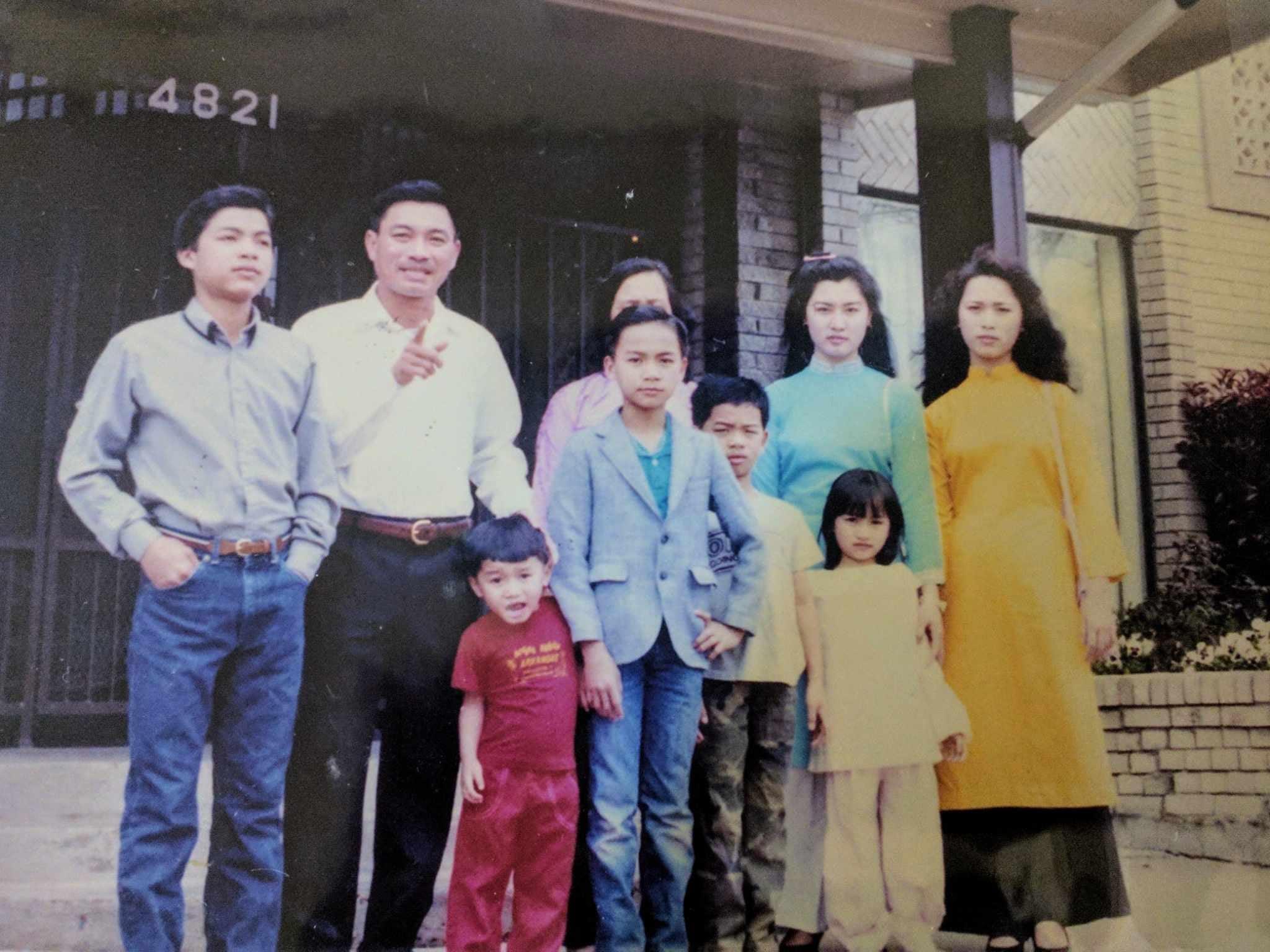 A group of people standing outside a building