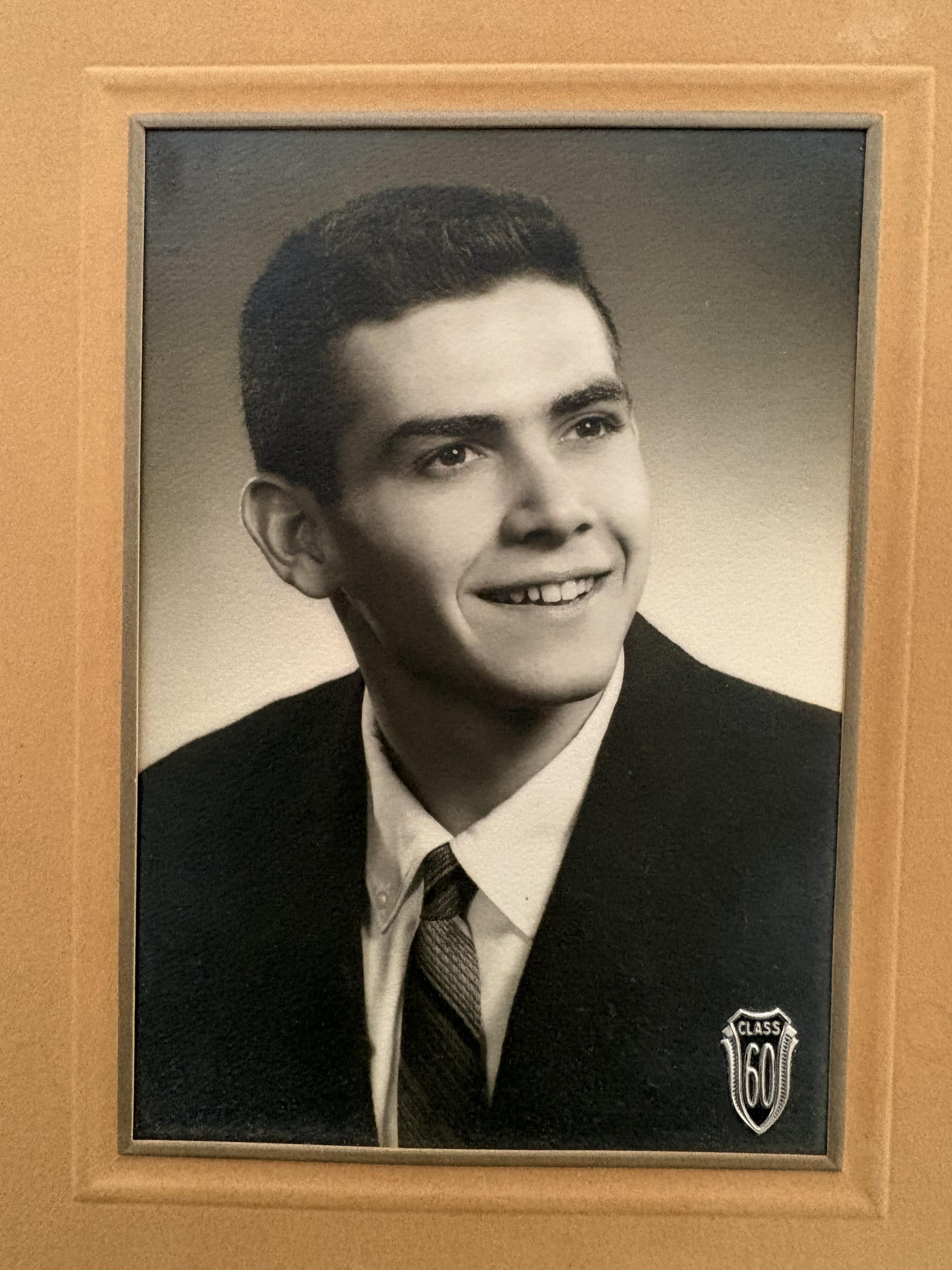 A portrait of a man in a suit