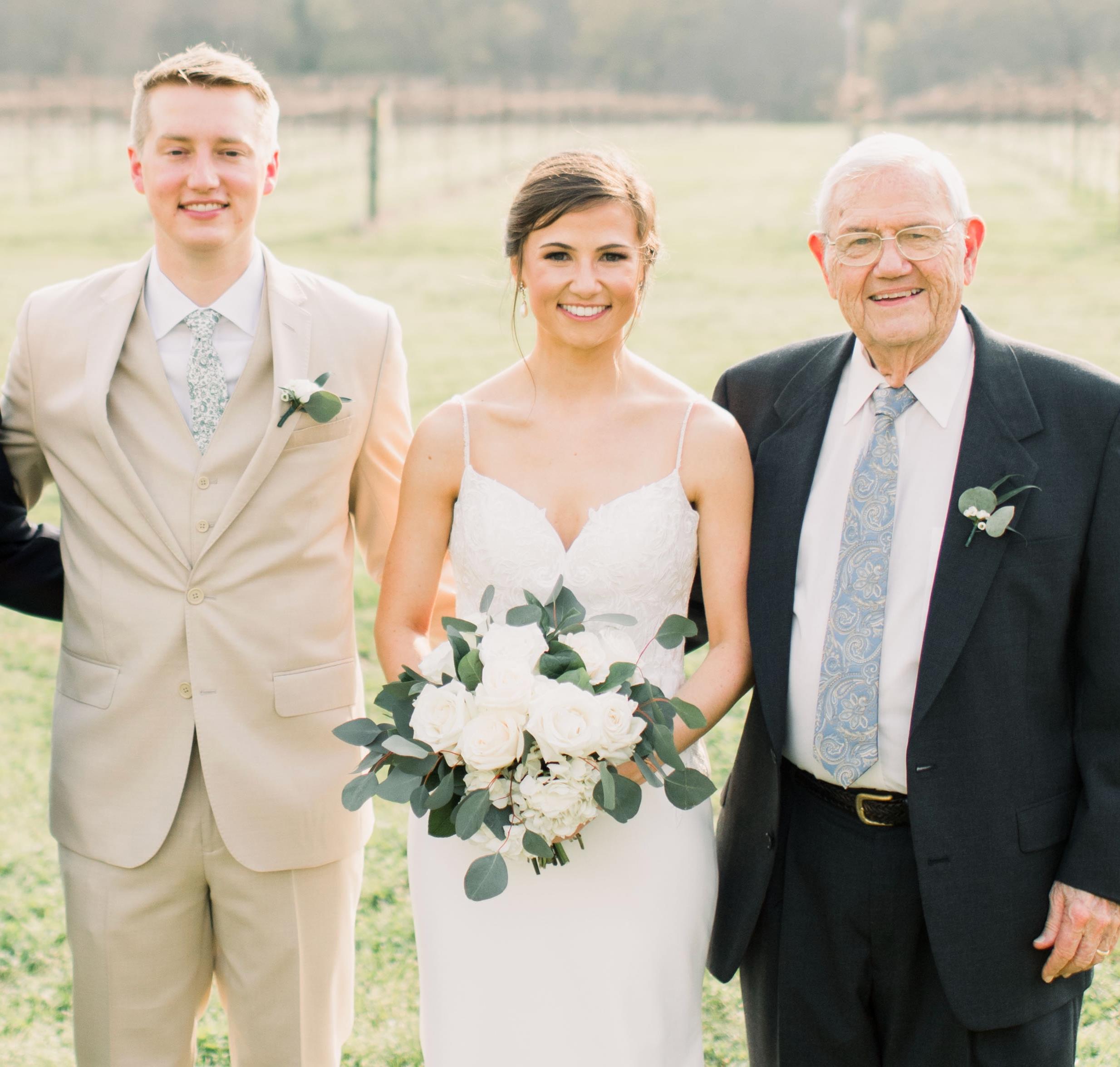 A man and woman posing for a picture
