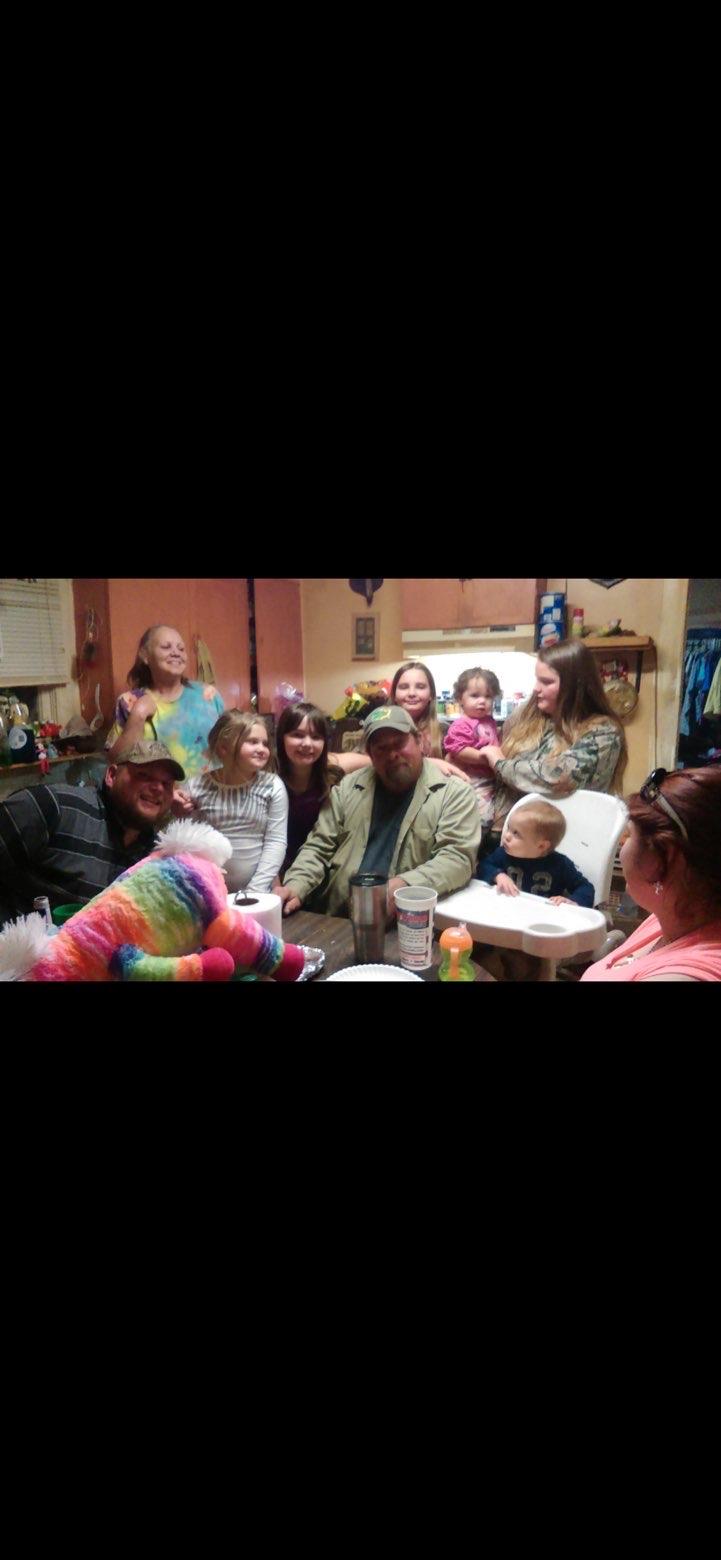 A group of people sitting around a table