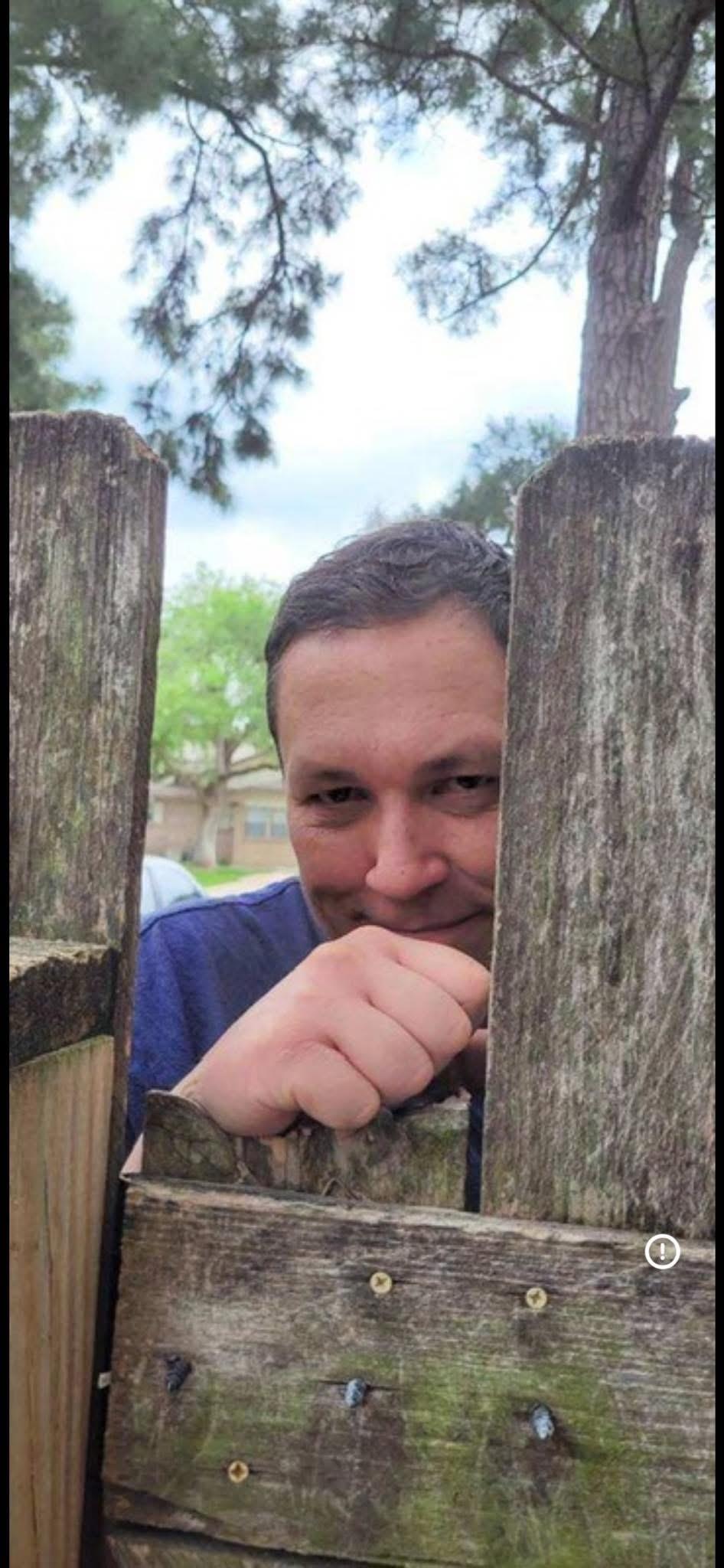 A man smiling at the camera