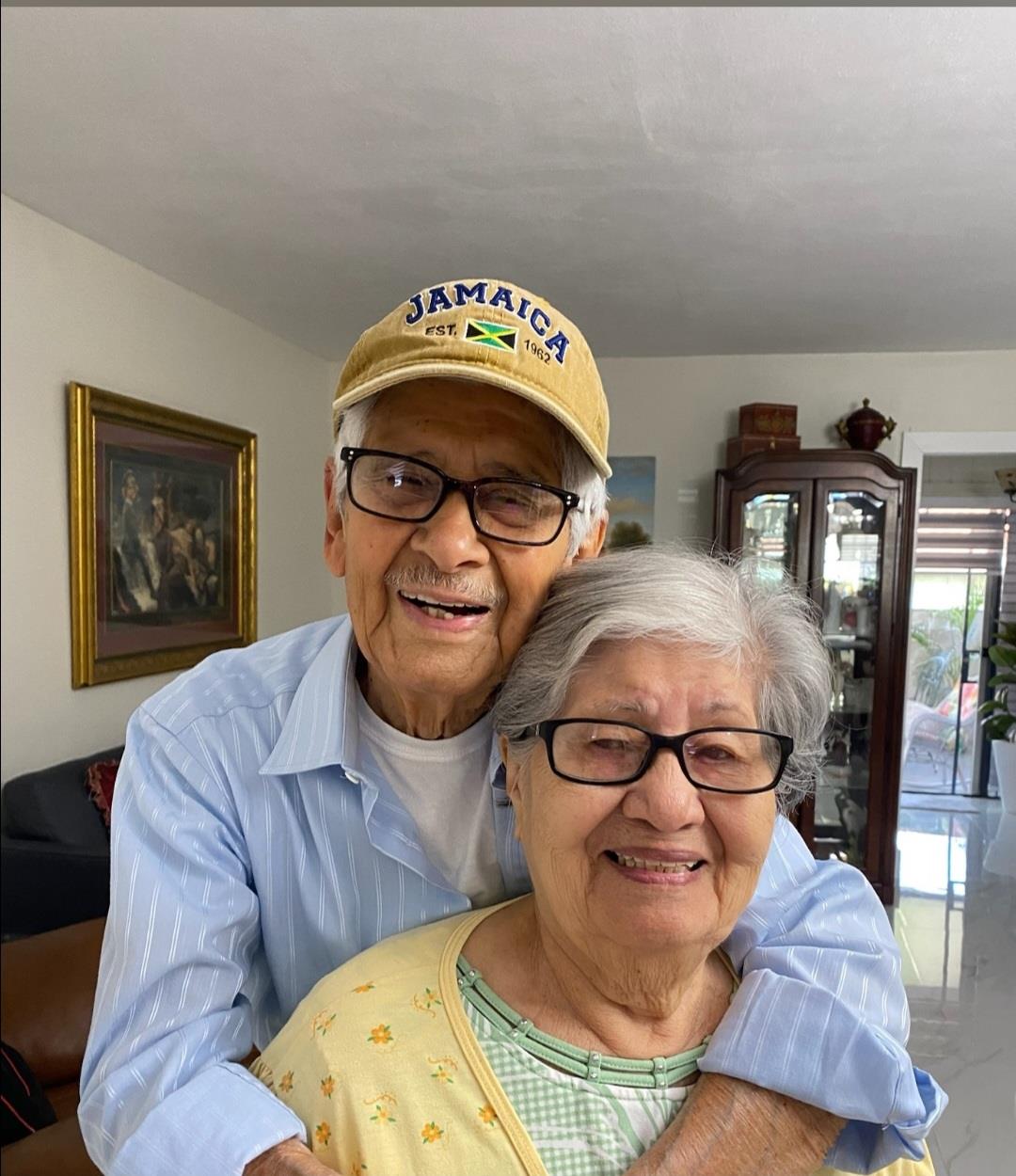 A man and woman posing for a picture