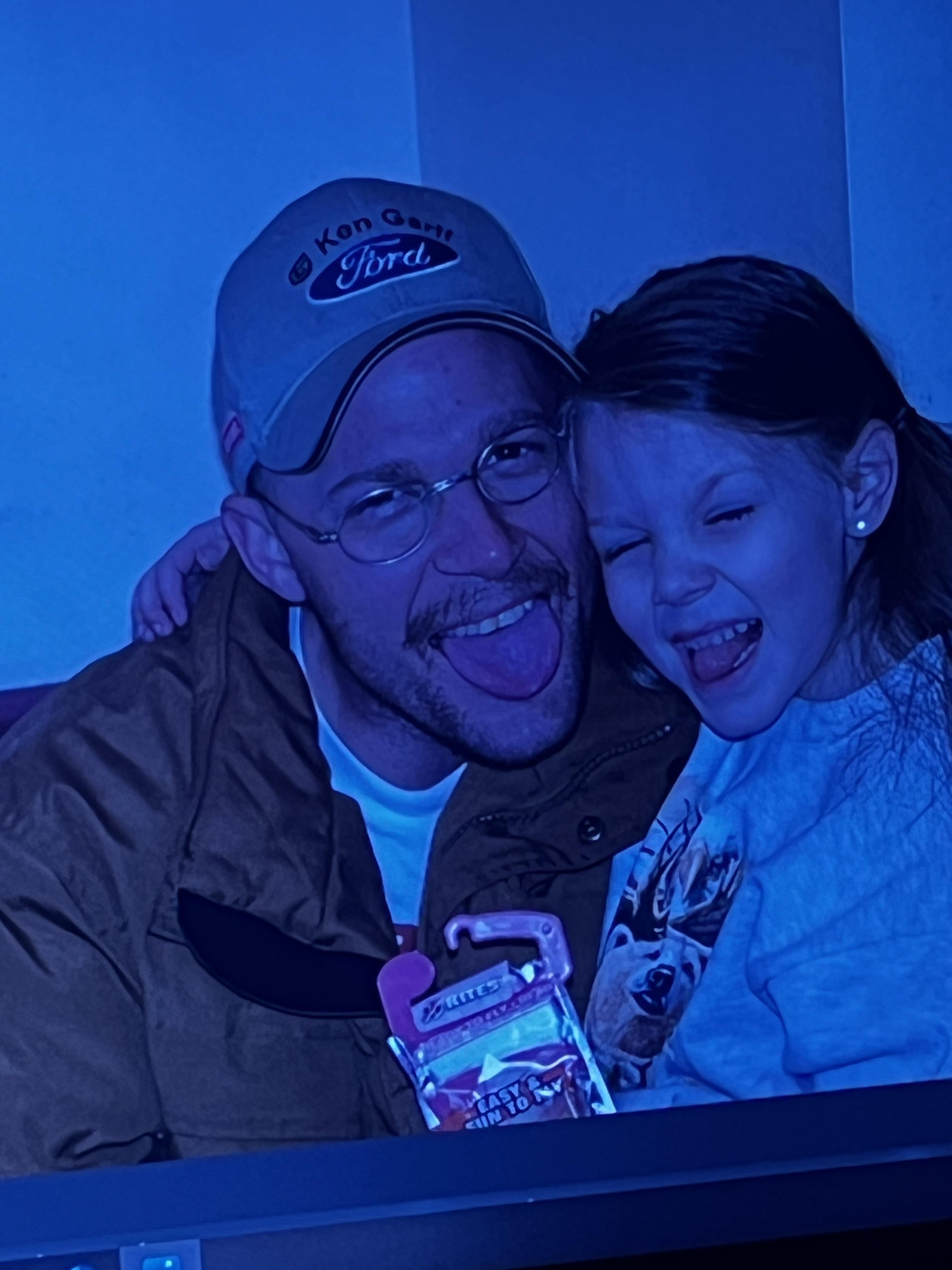 A man and girl taking a selfie