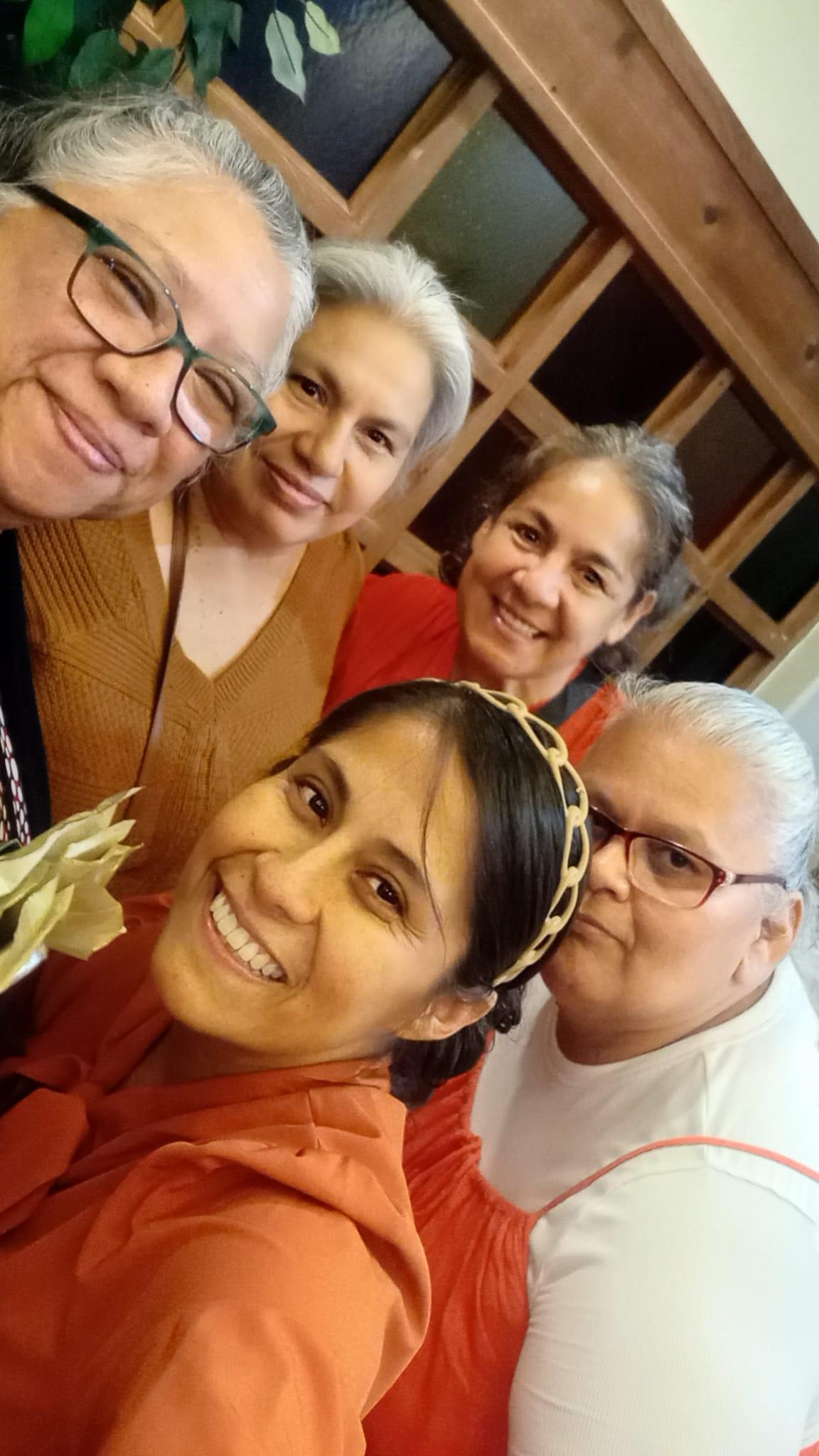 A group of women posing for a selfie