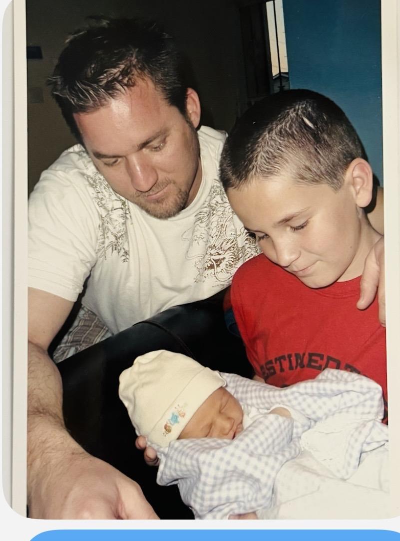 A man holding a baby