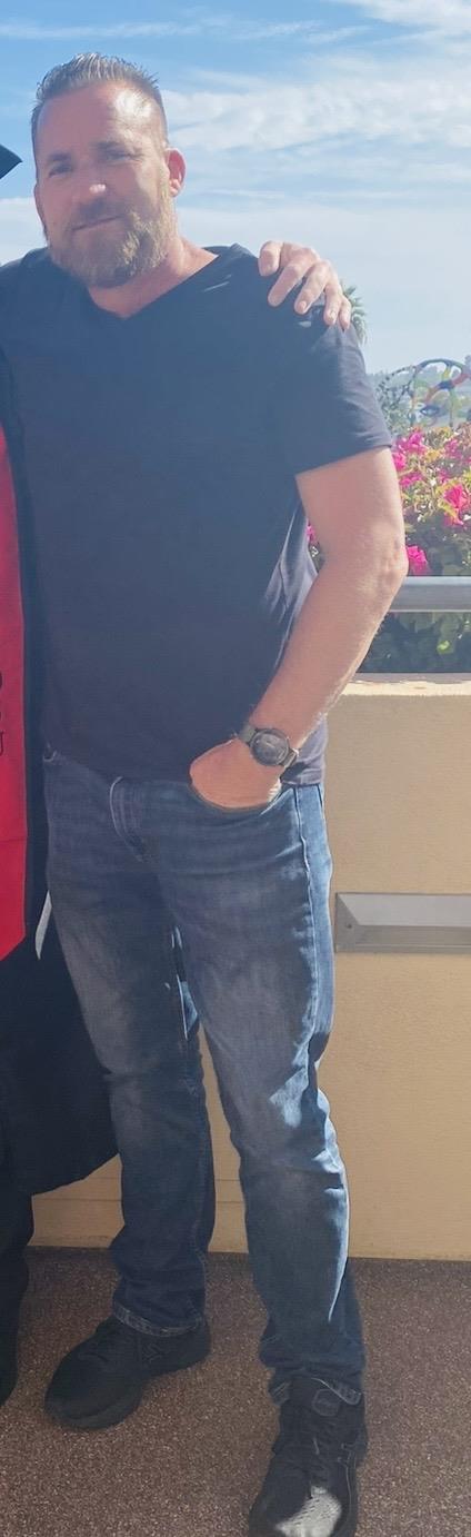 A man with his hands in his pockets