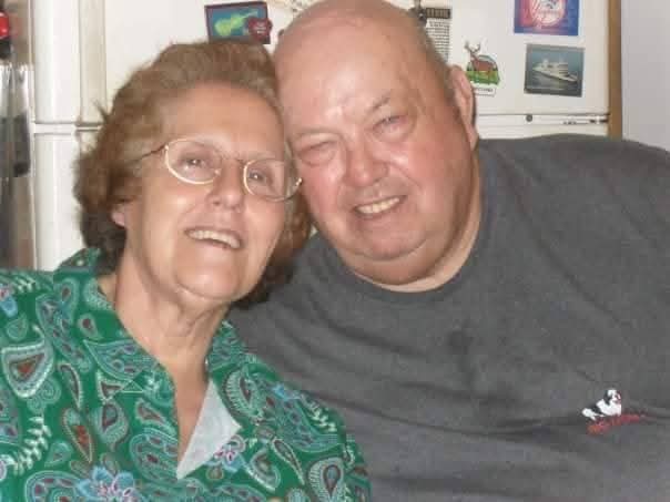 A man and woman smiling for a picture