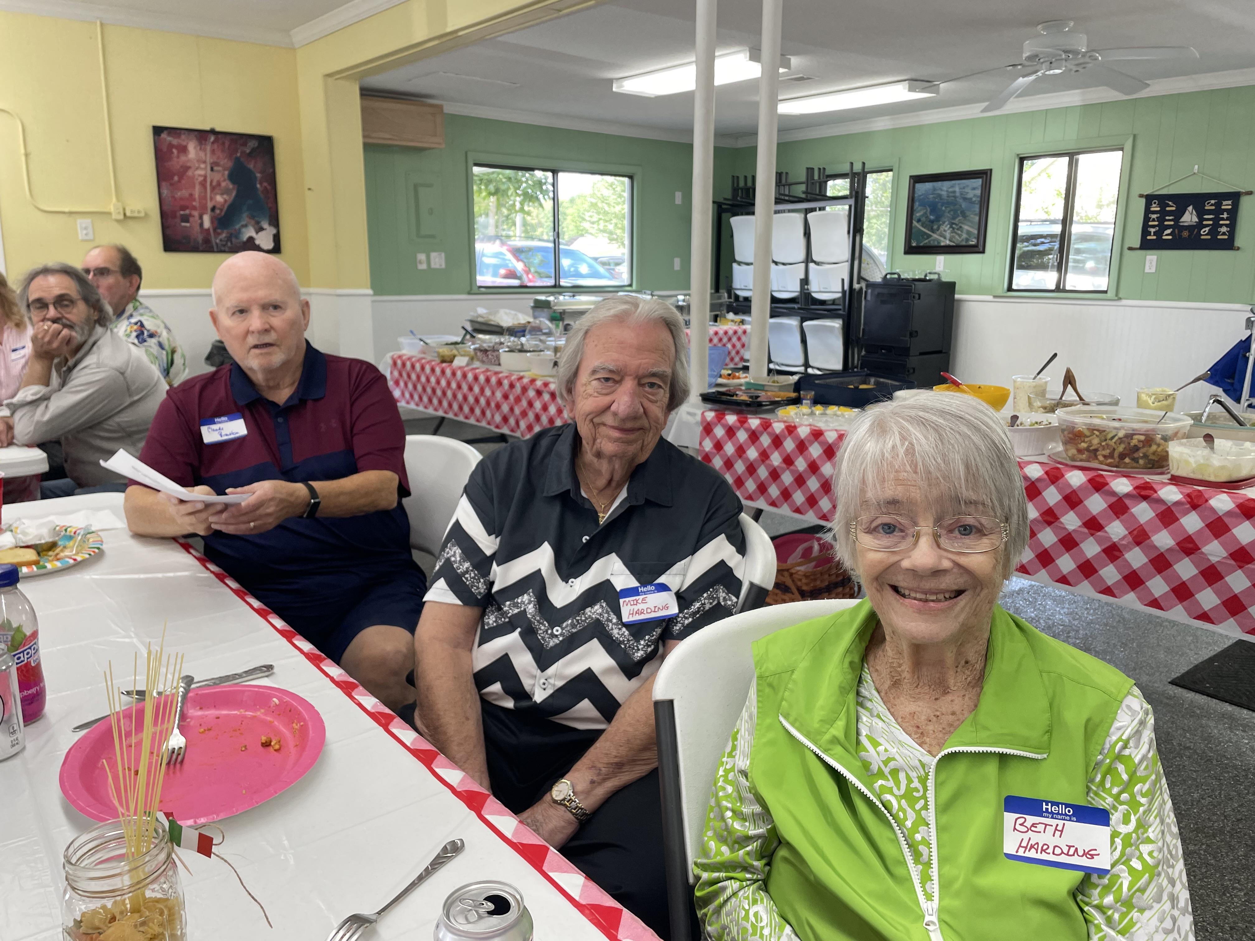 A group of people sitting at a table
