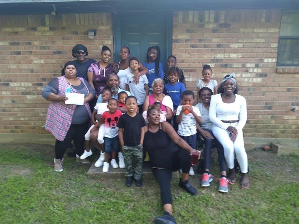 A group of people posing for a photo