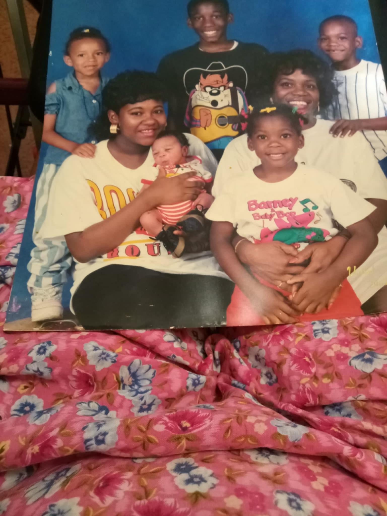 A group of people on a bed