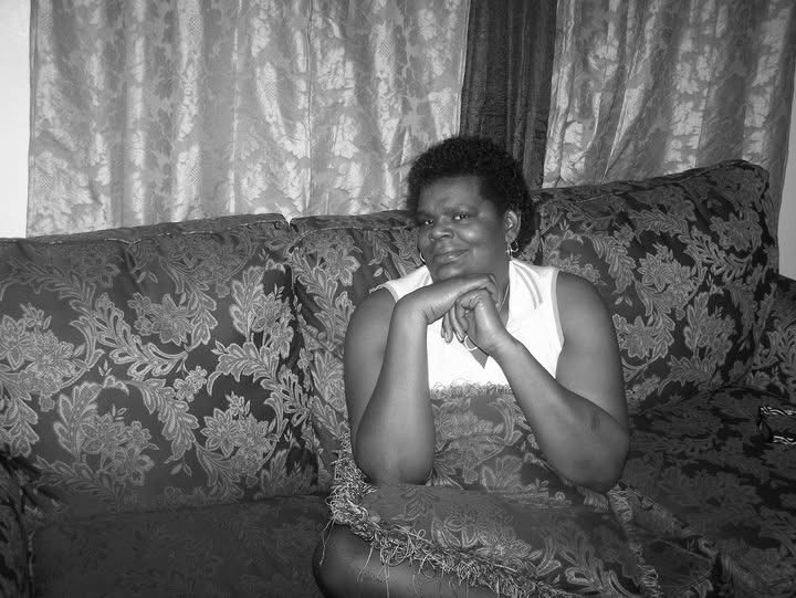 A woman sitting on a couch