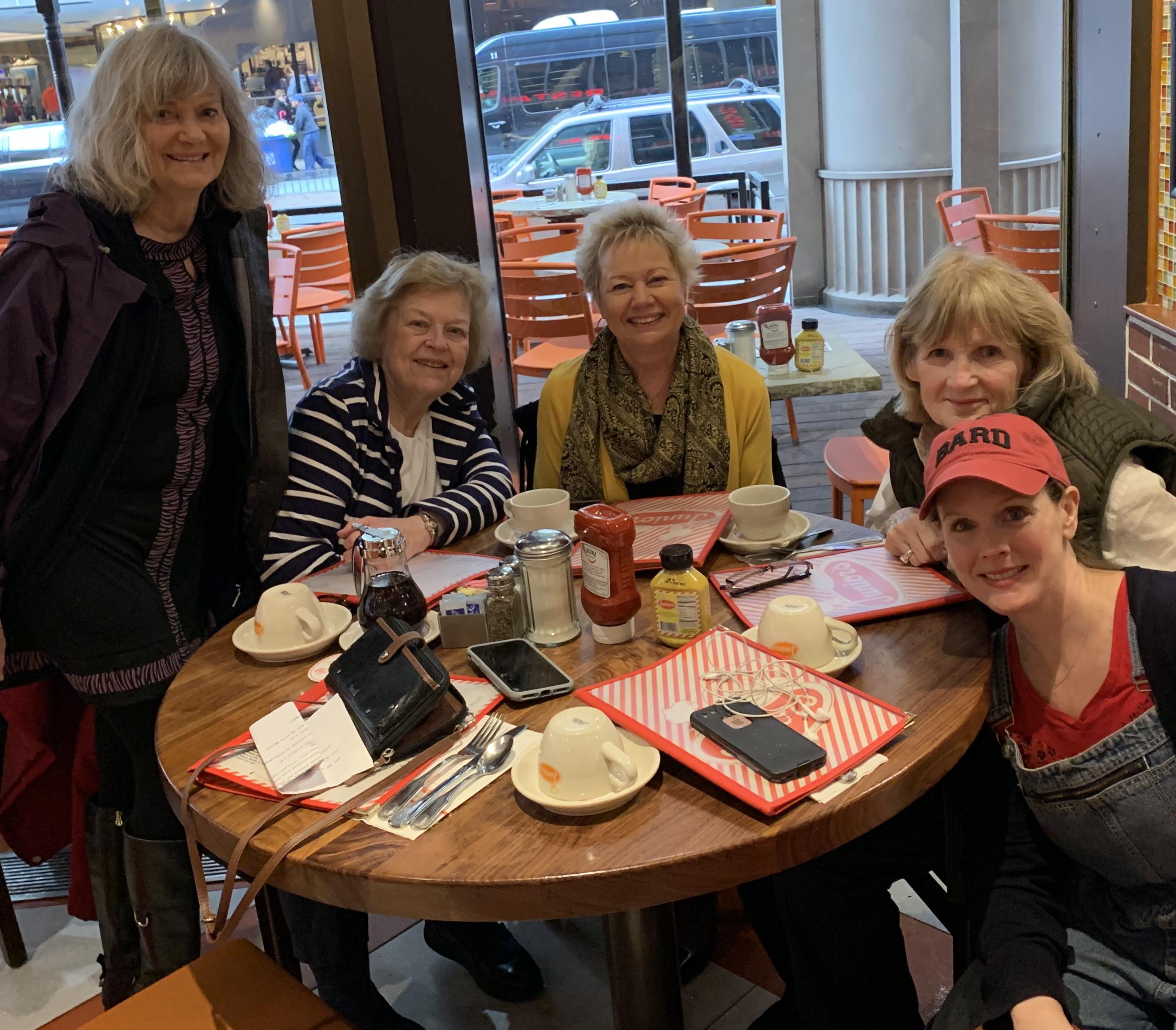 A group of women sitting around a table