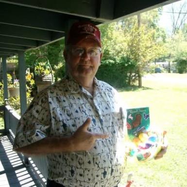 A man holding a basket of eggs