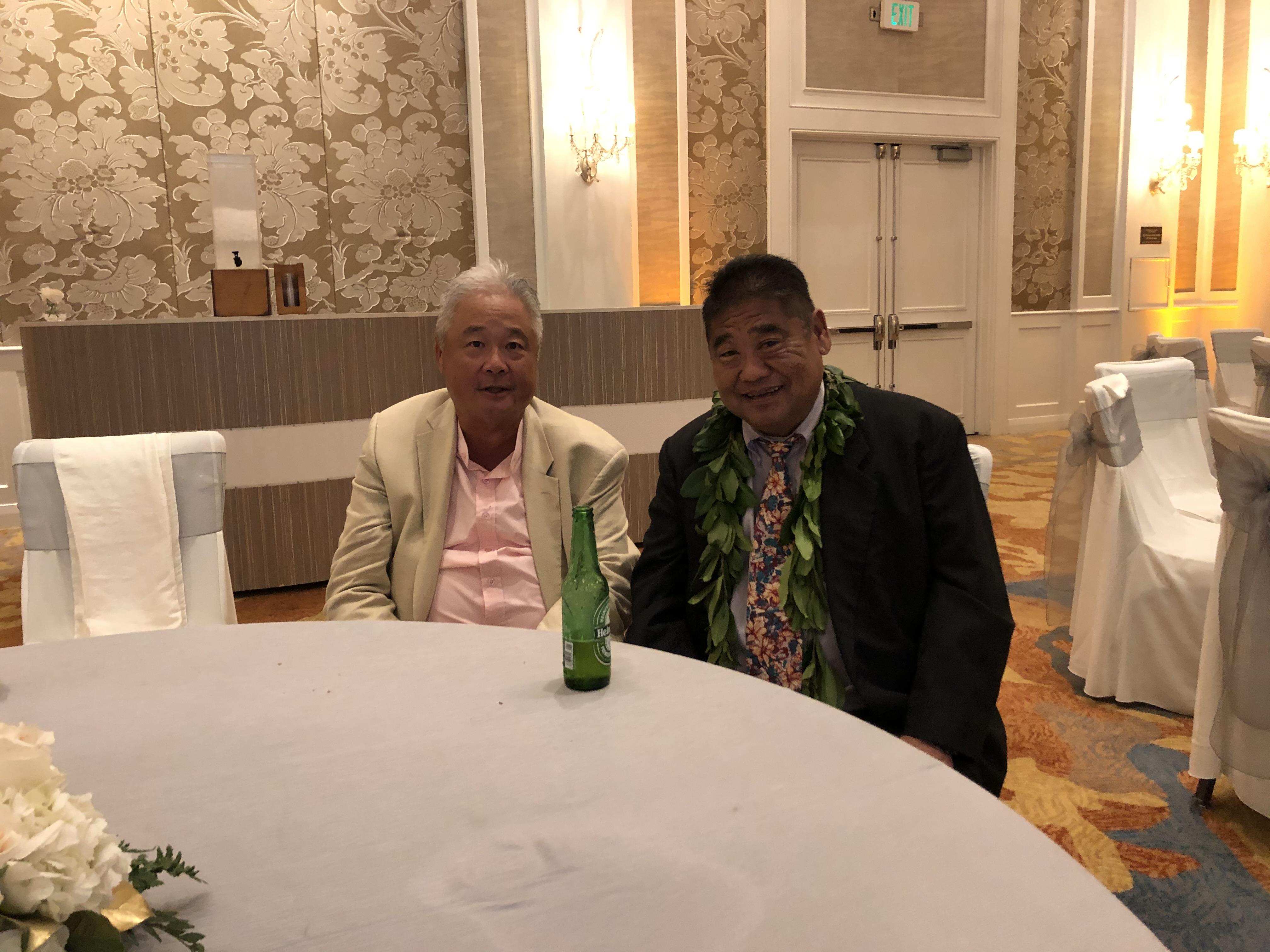 Two men sitting at a table