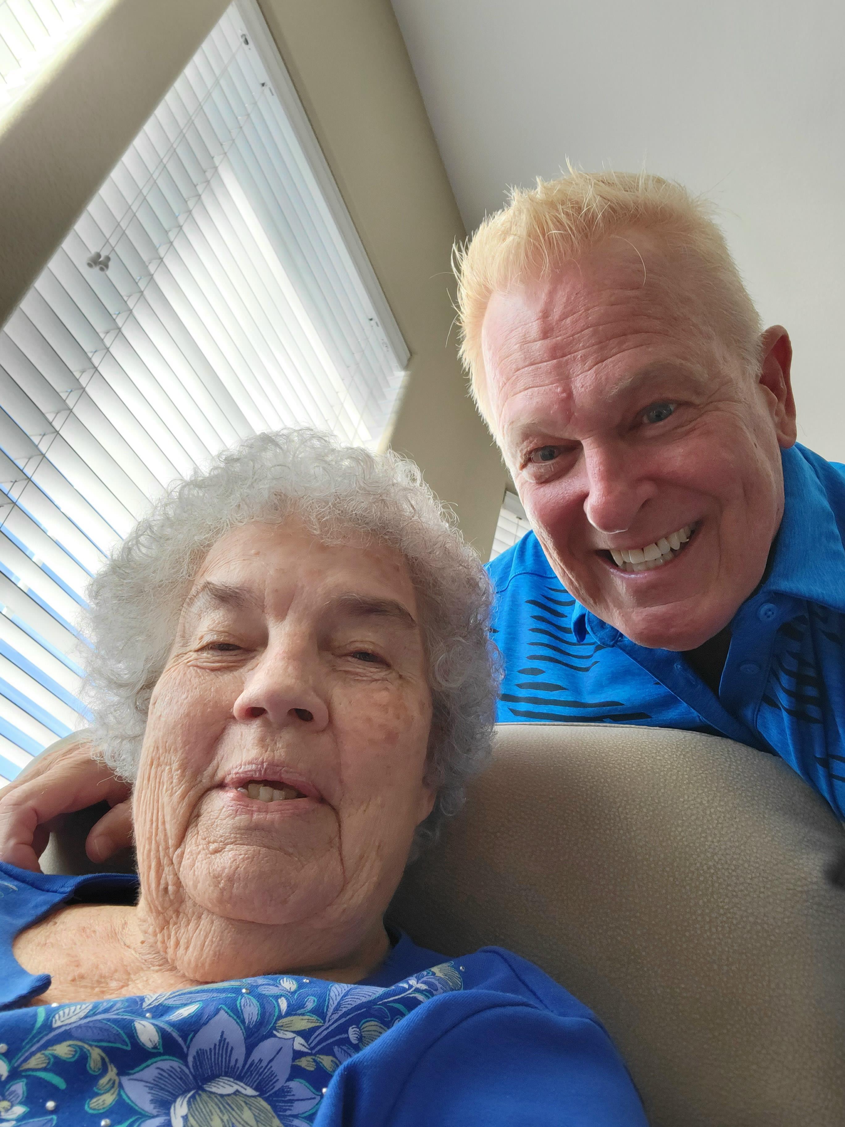 A man and woman taking a selfie