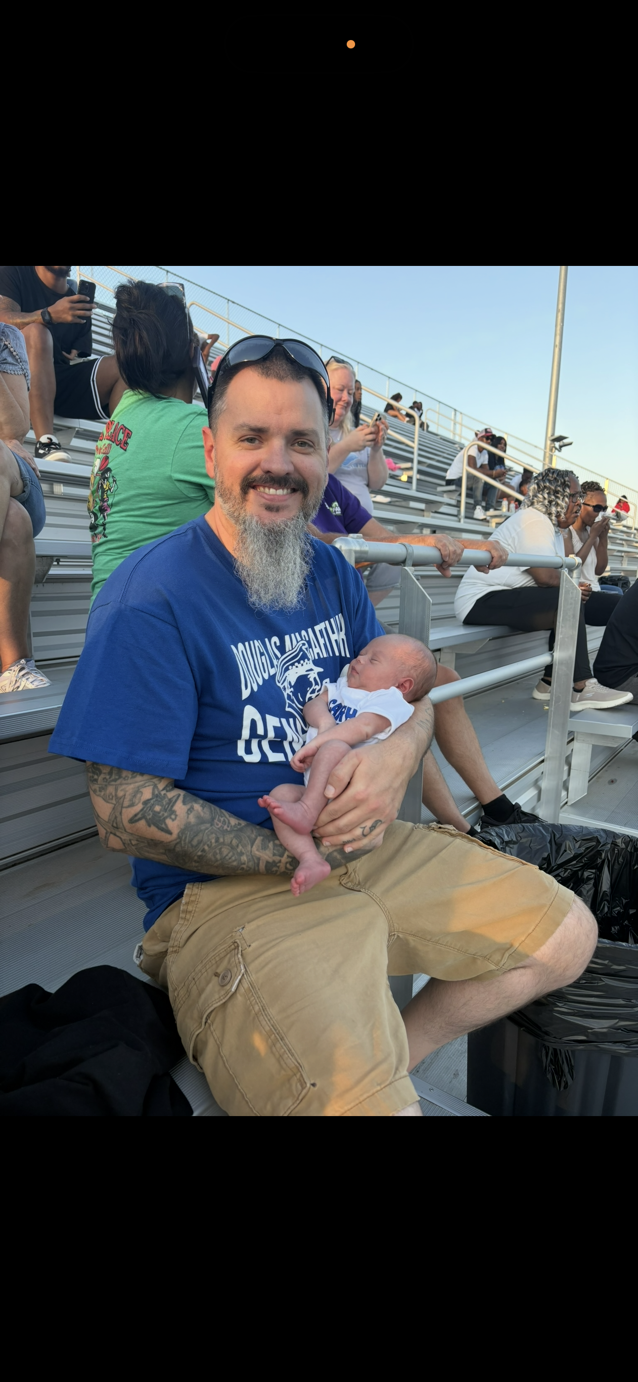 A man holding a baby