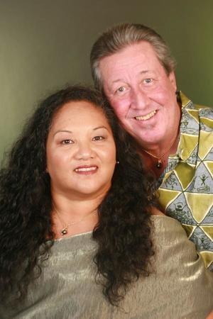 A man and woman smiling for a picture
