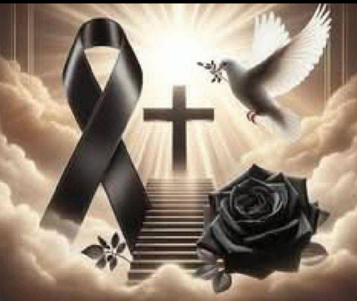 A black ribbon with a cross and a rose