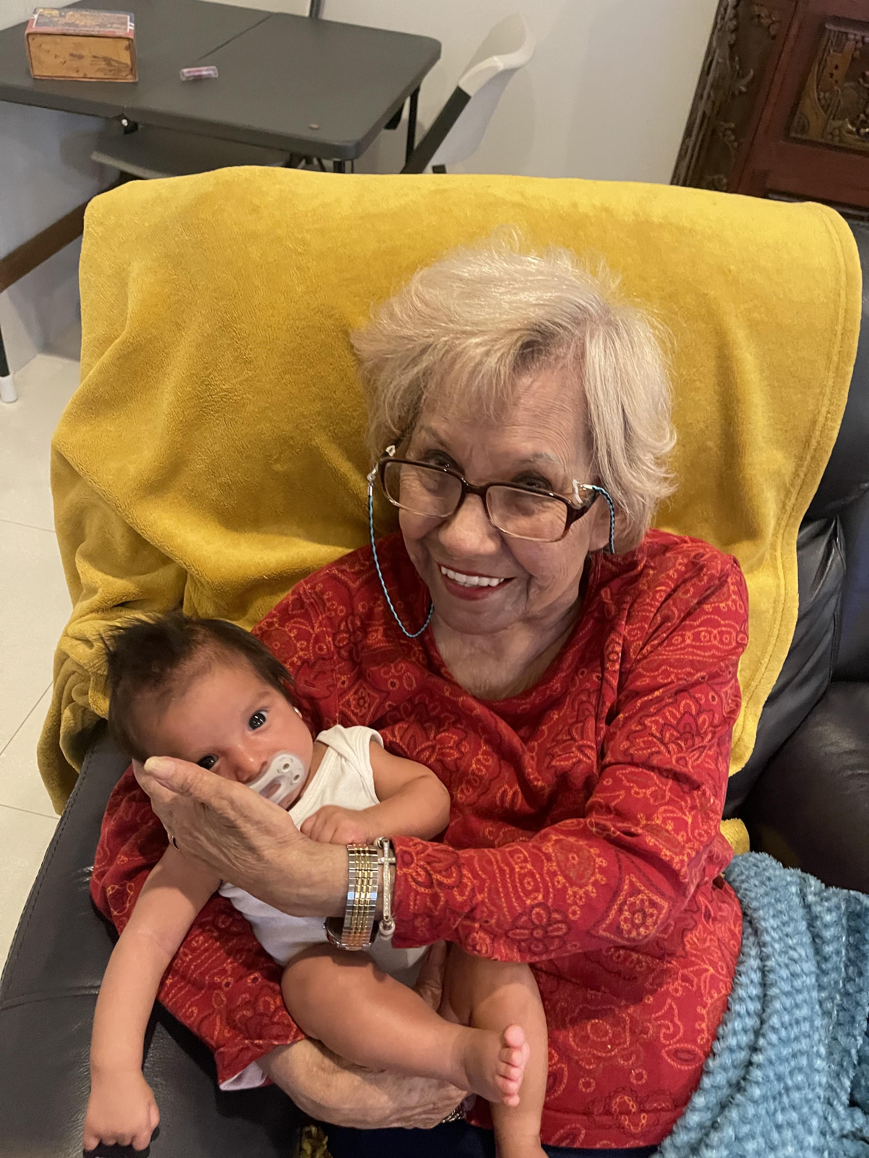 A woman holding a baby