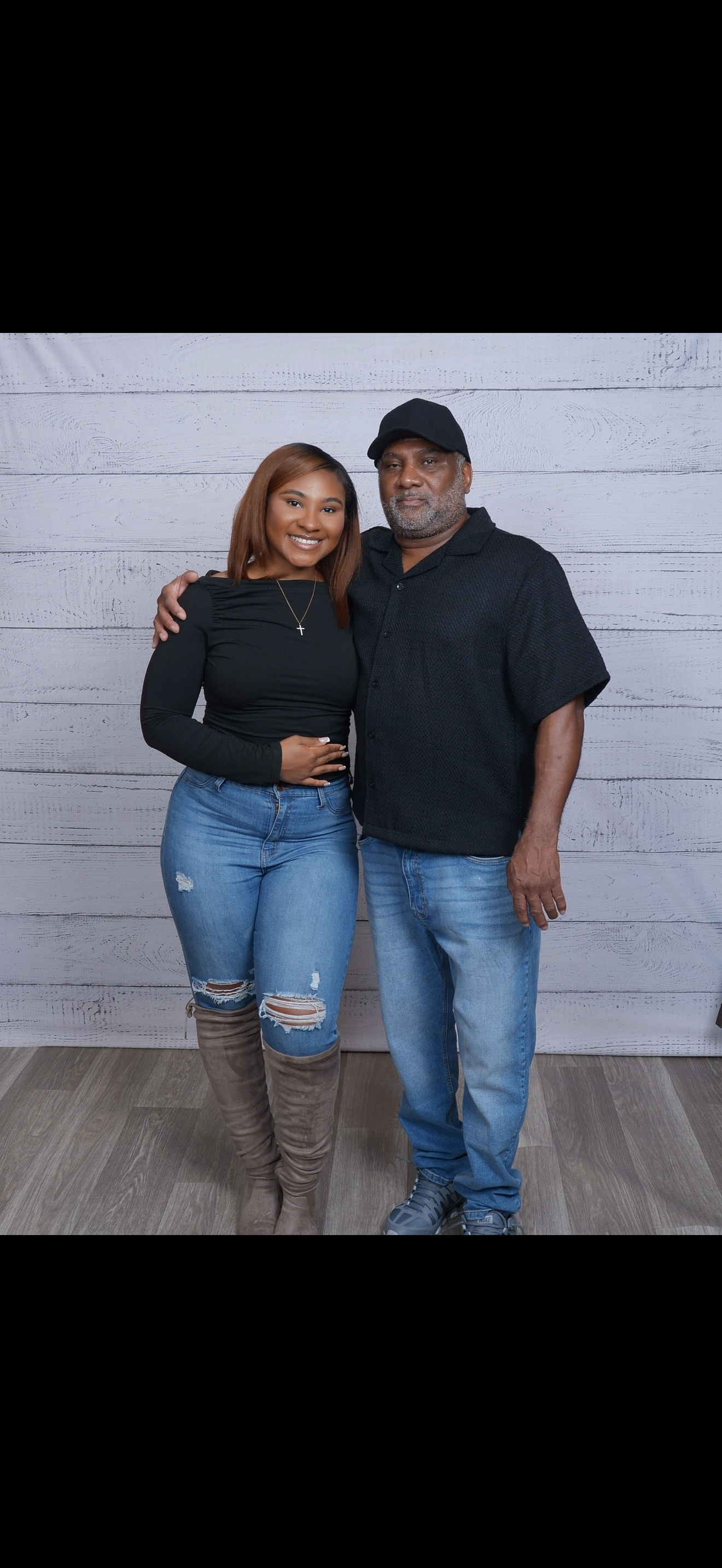 A man and woman posing for a picture
