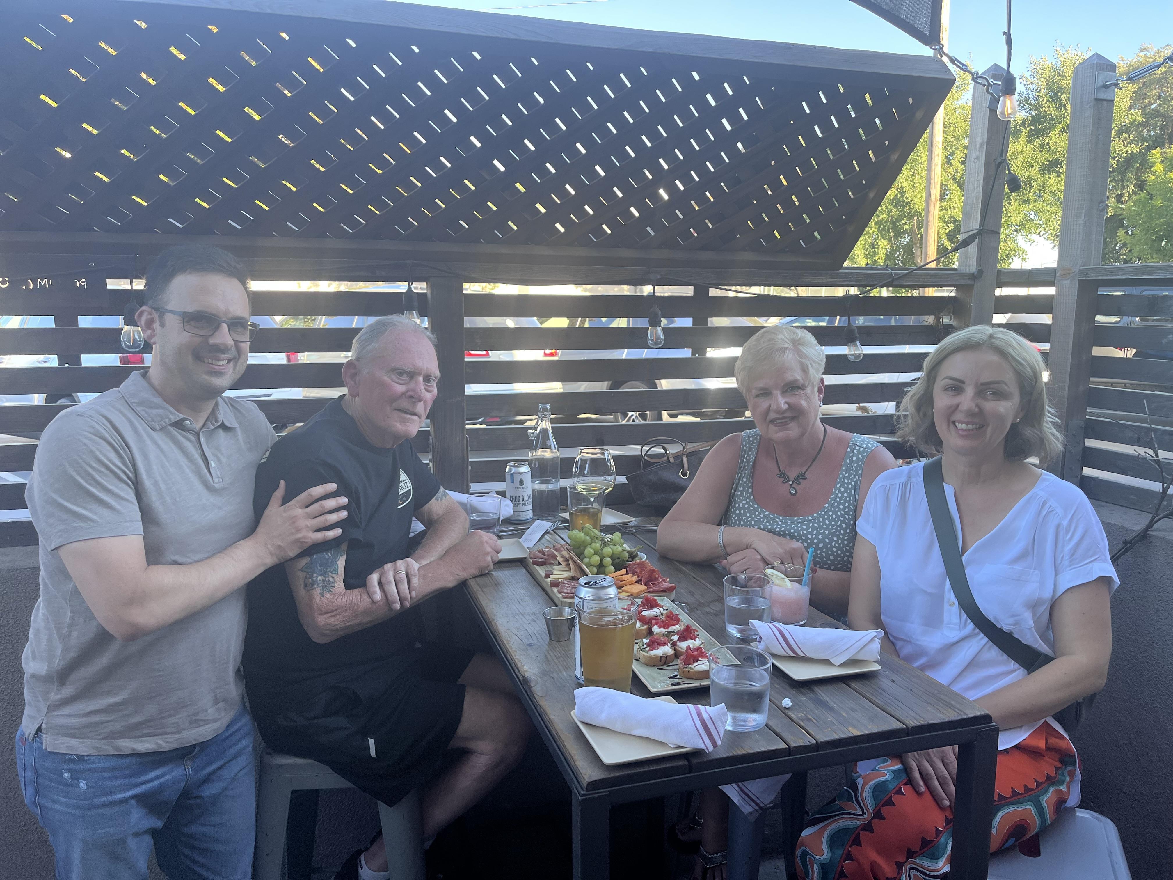 A group of people sitting at a table