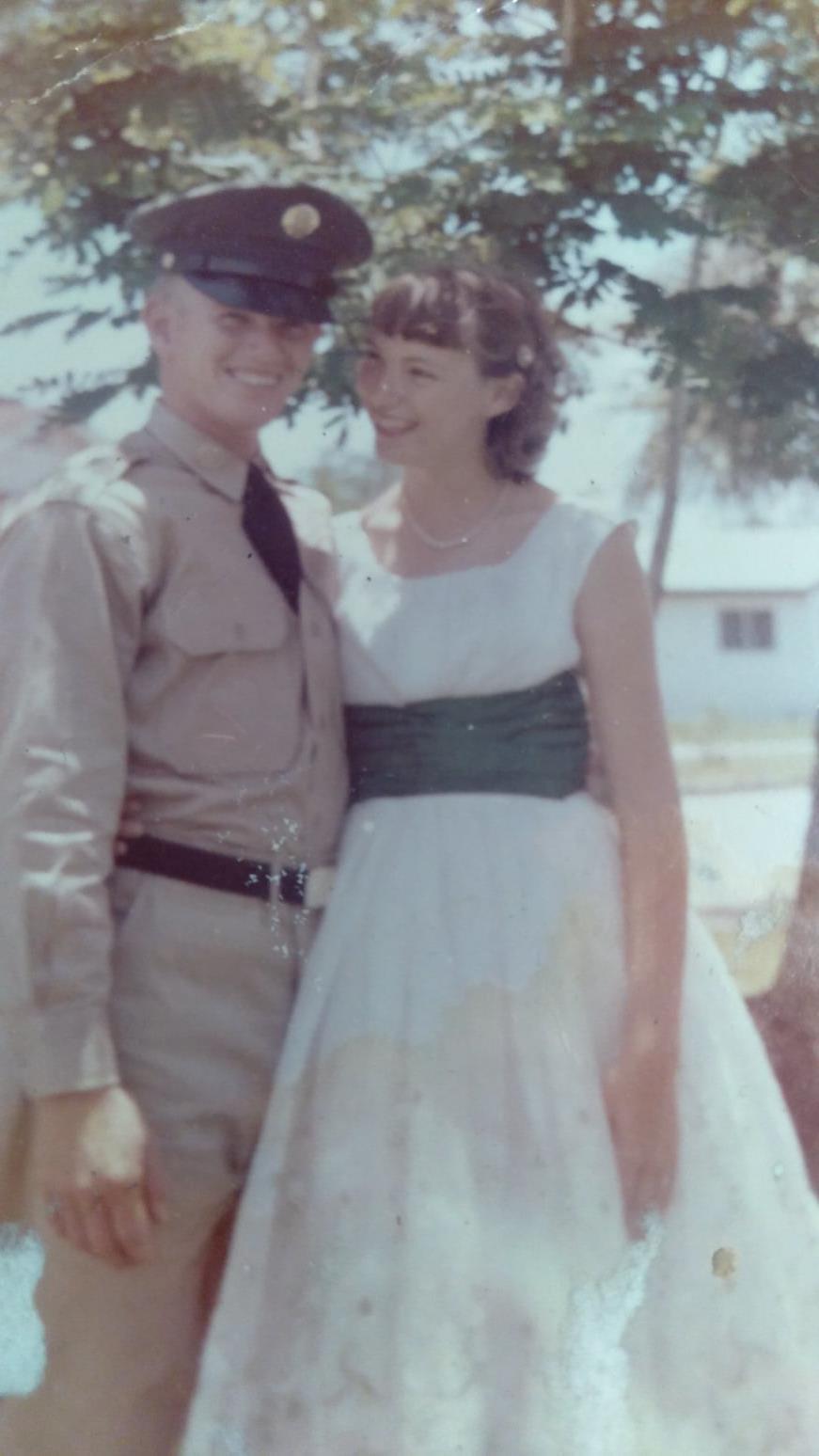 A man and woman in military uniform