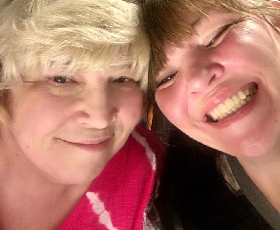 Two women smiling for the camera