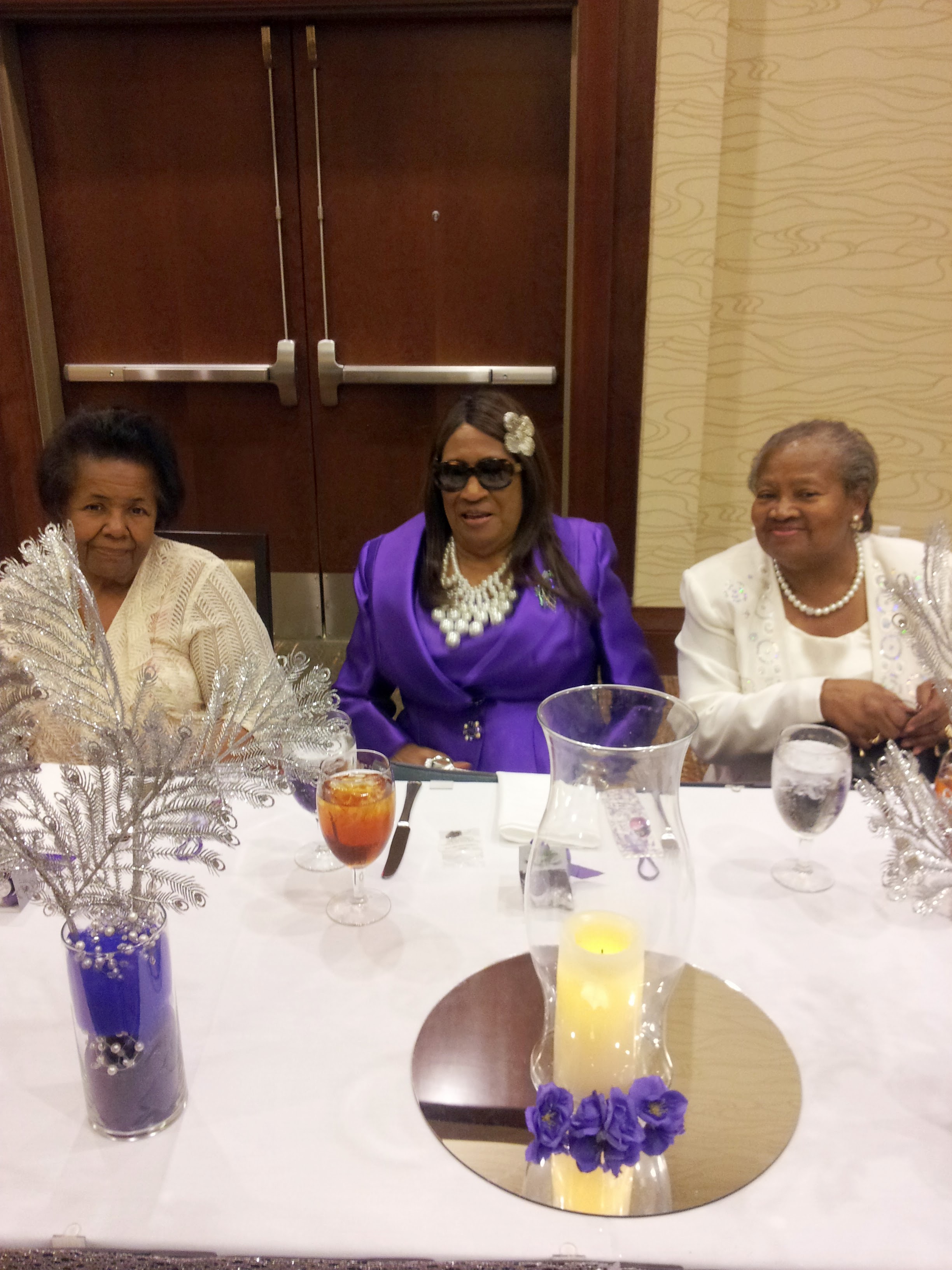 A group of women sitting at a table