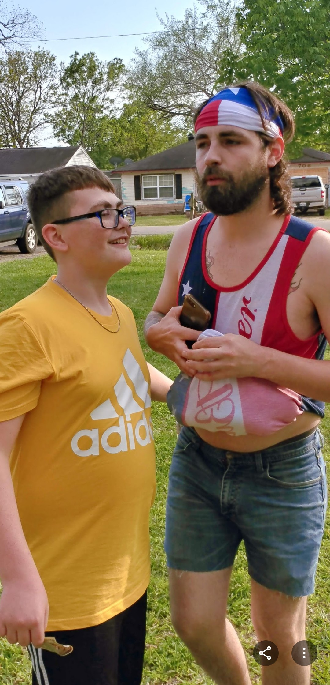 A man standing next to a man