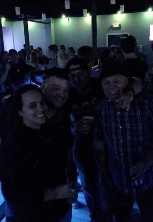 A group of people posing for a photo