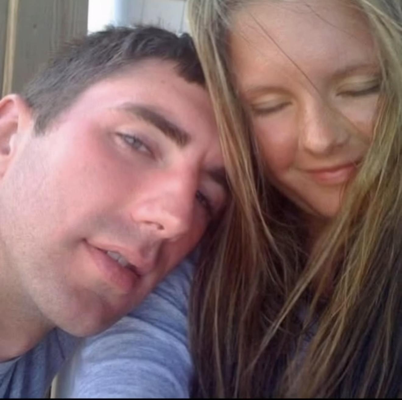 A man and woman taking a selfie